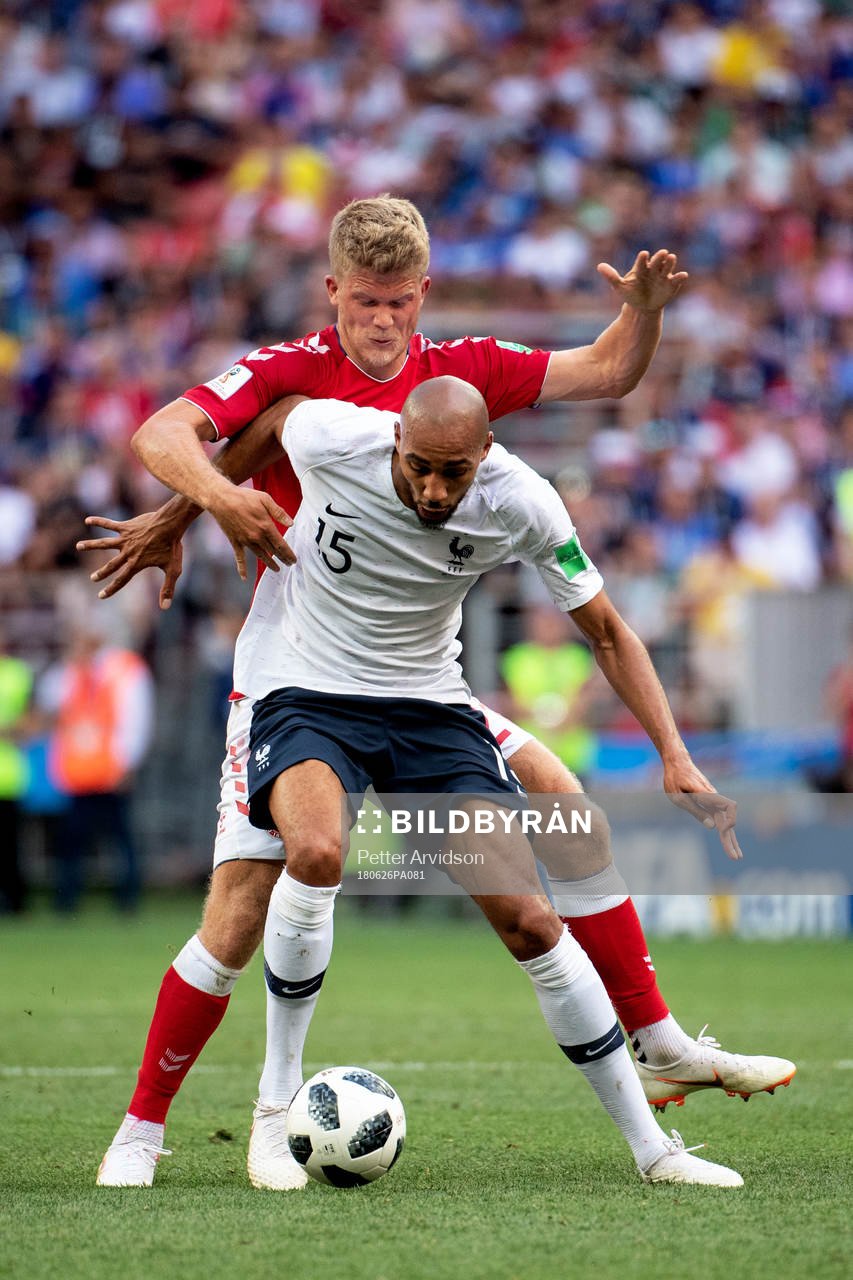 Andreas Cornelius of Denmark and Steven Nzonzi of France