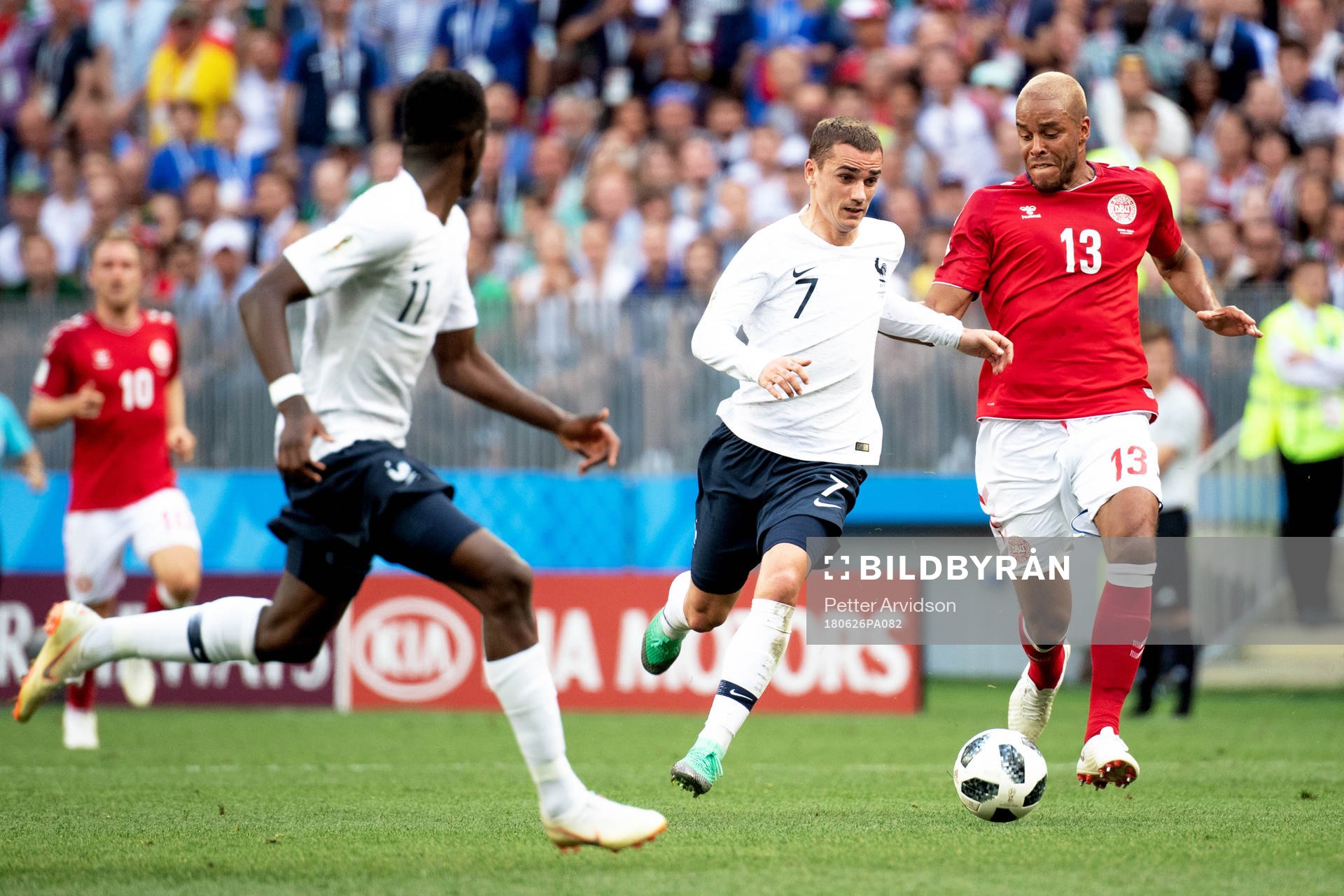 Antoine Griezmann of France and Mathias Jørgensen of