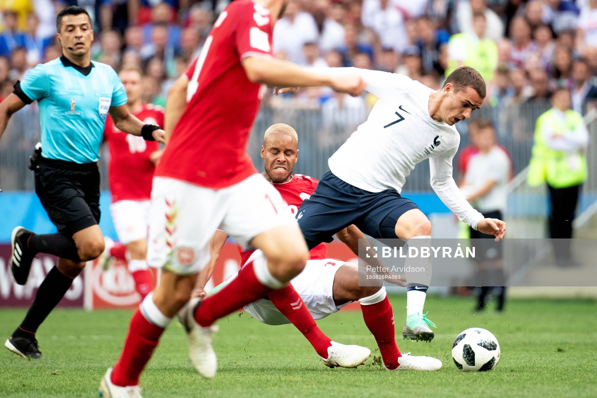Mathias Jørgensen of Denmark and Antoine Griezmann of