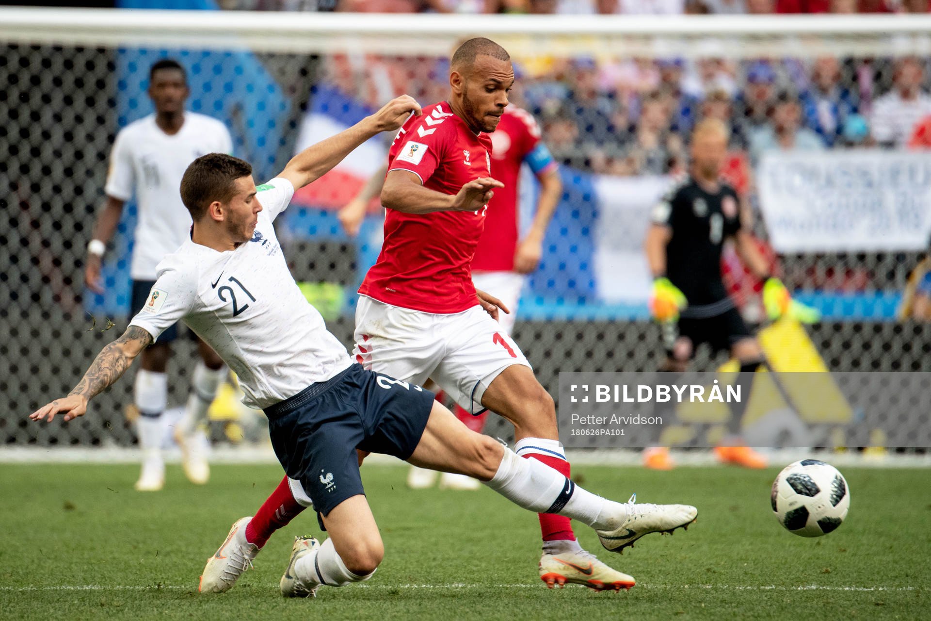 Lucas Hernandez of France and Martin Braithwaite of Denmark