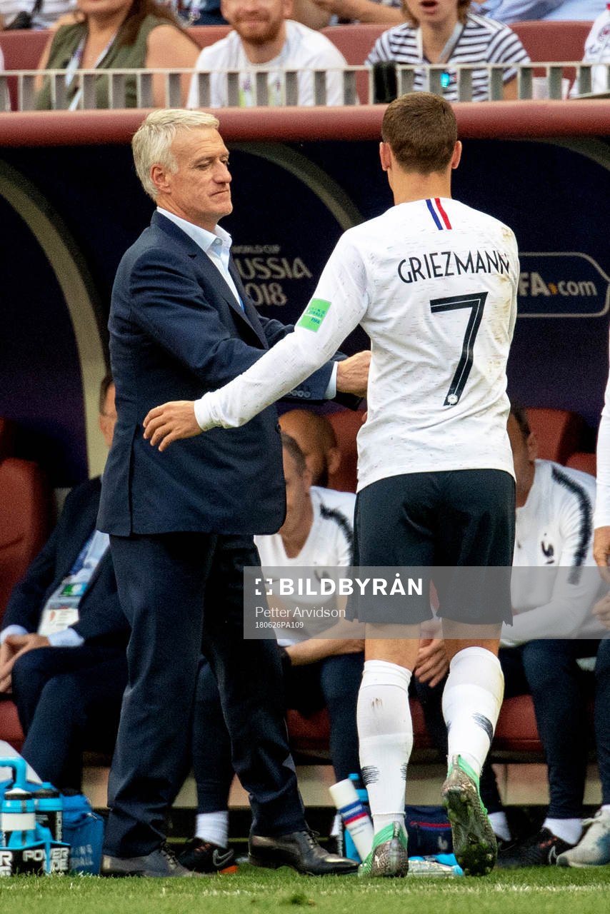 head coach Didier Deschamps and Antoine Griezmann of France