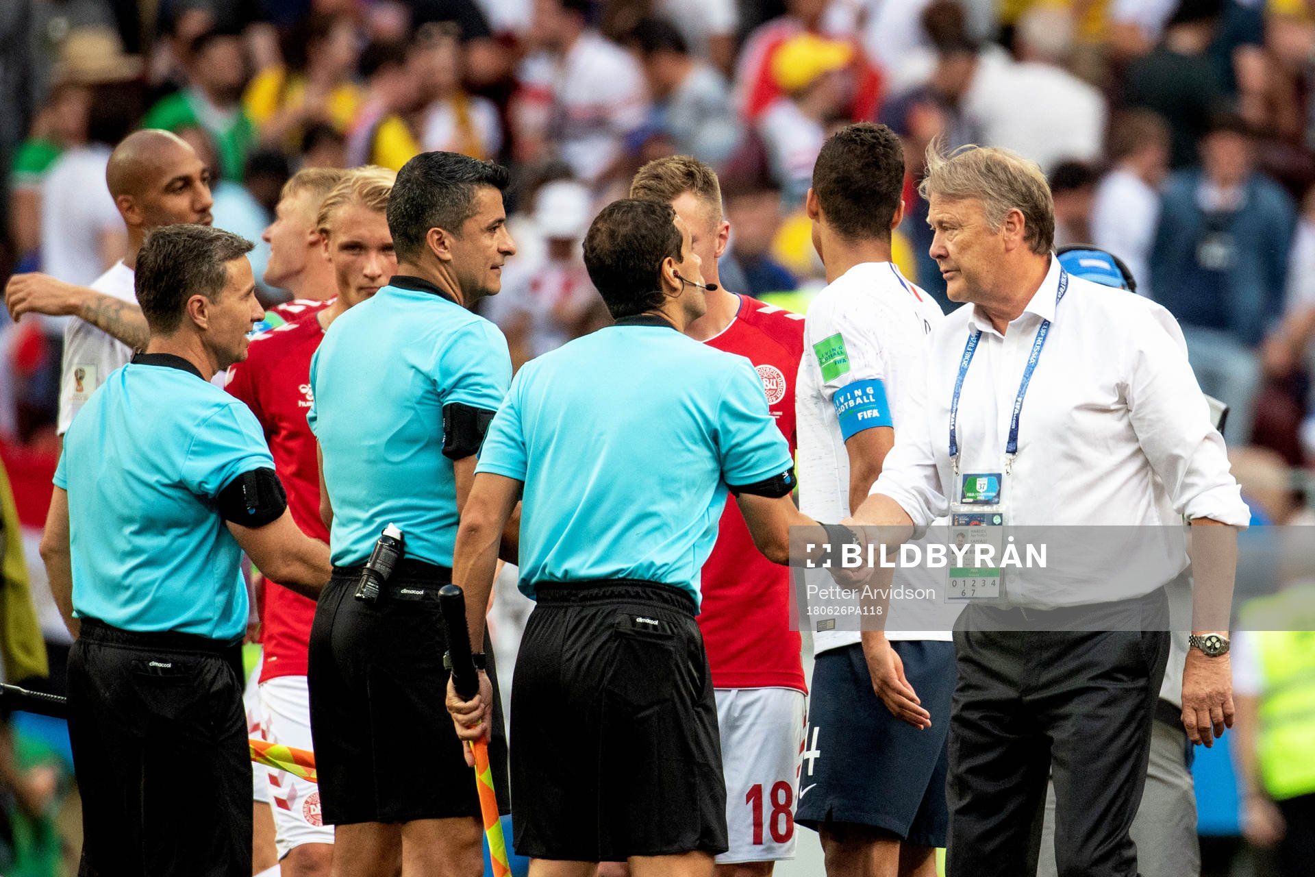 head coach Åge Hareide of Denmark and referee Sandro Ricci