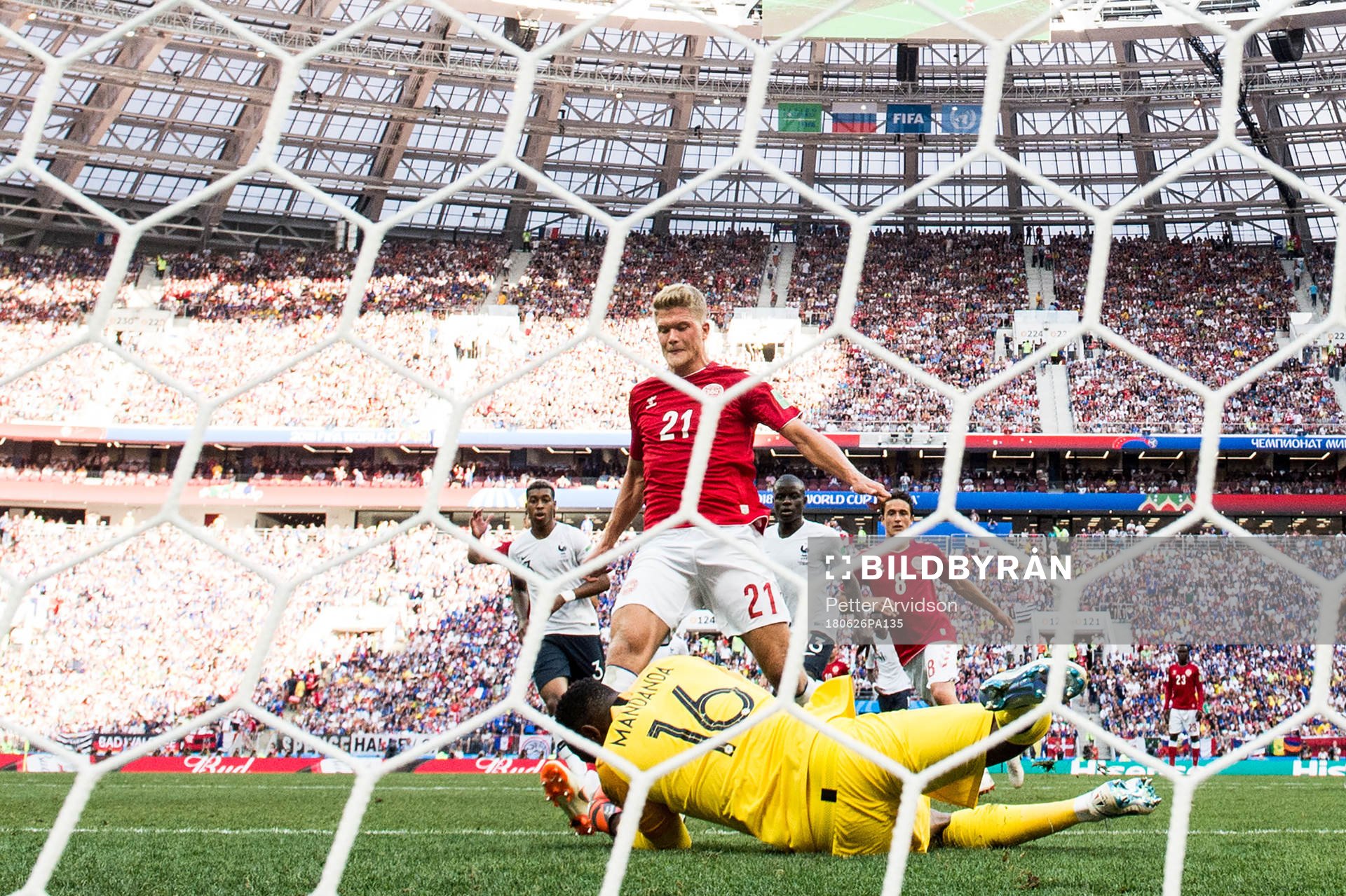 Andreas Cornelius of Denmark against goalkeeper Steve