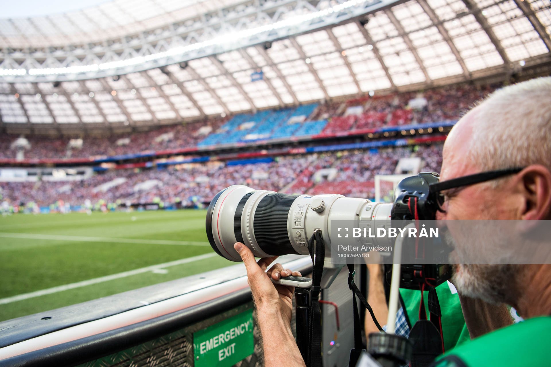 A photographer cover the FIFA World Cup group stage match