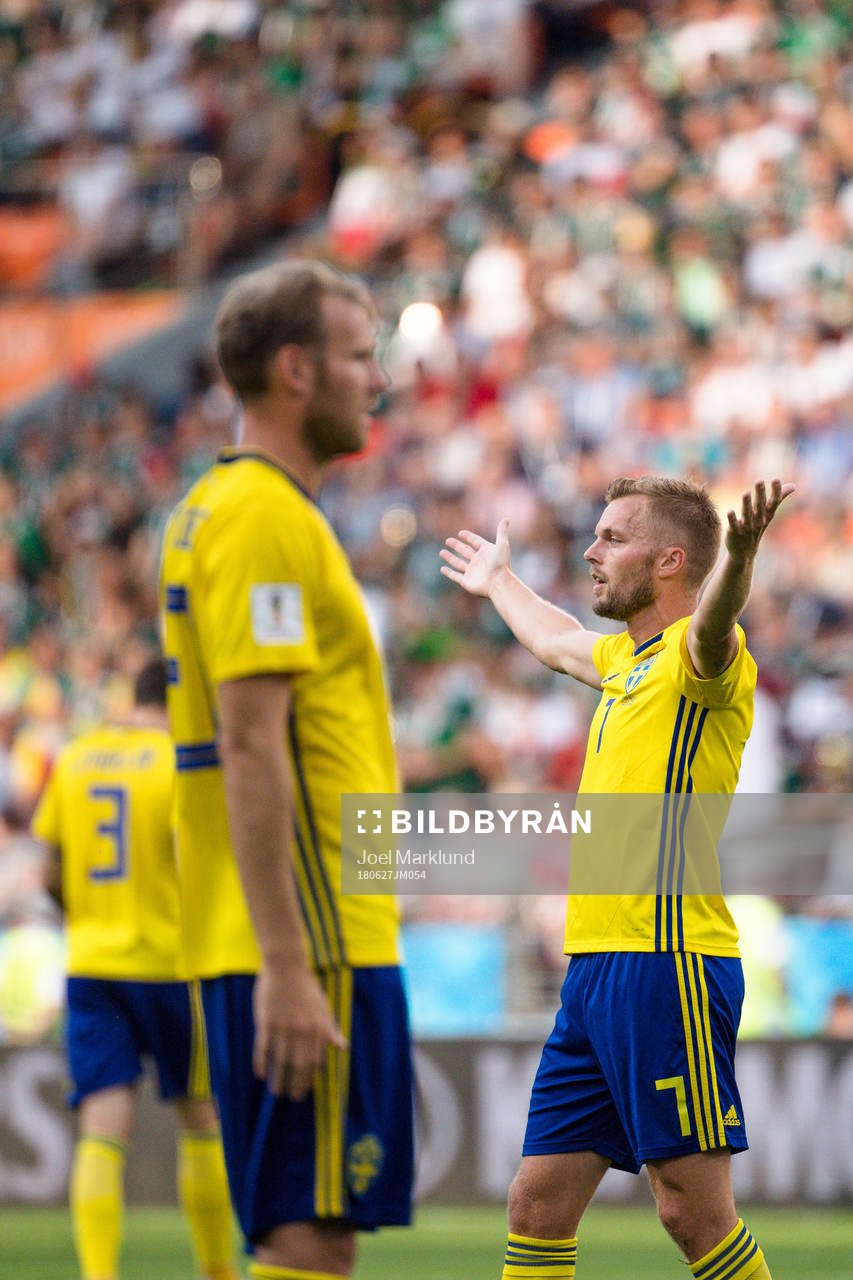 Ola Toivonen and Sebastian Larsson of Sweden looks dejected