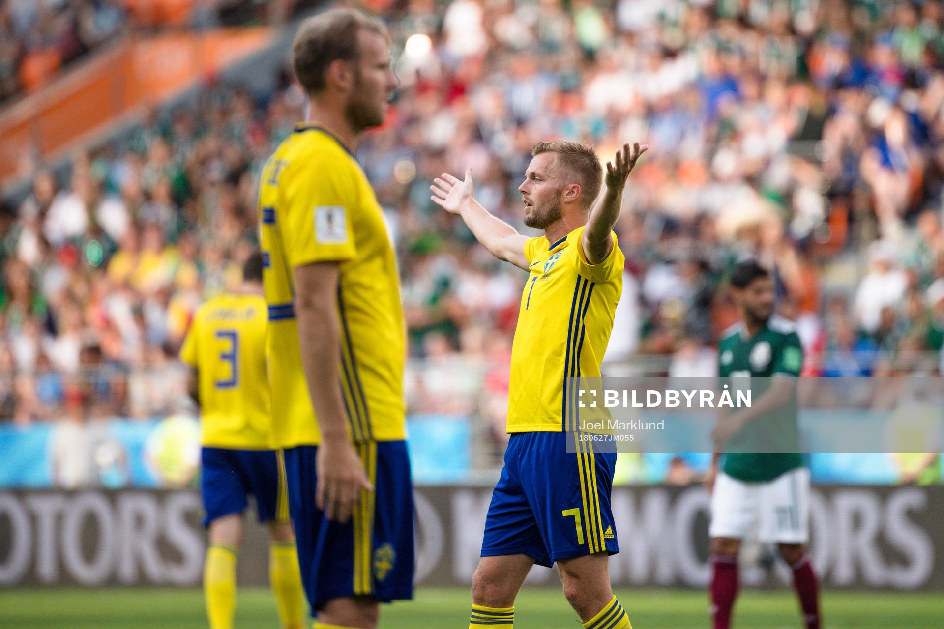 Ola Toivonen and Sebastian Larsson of Sweden looks dejected
