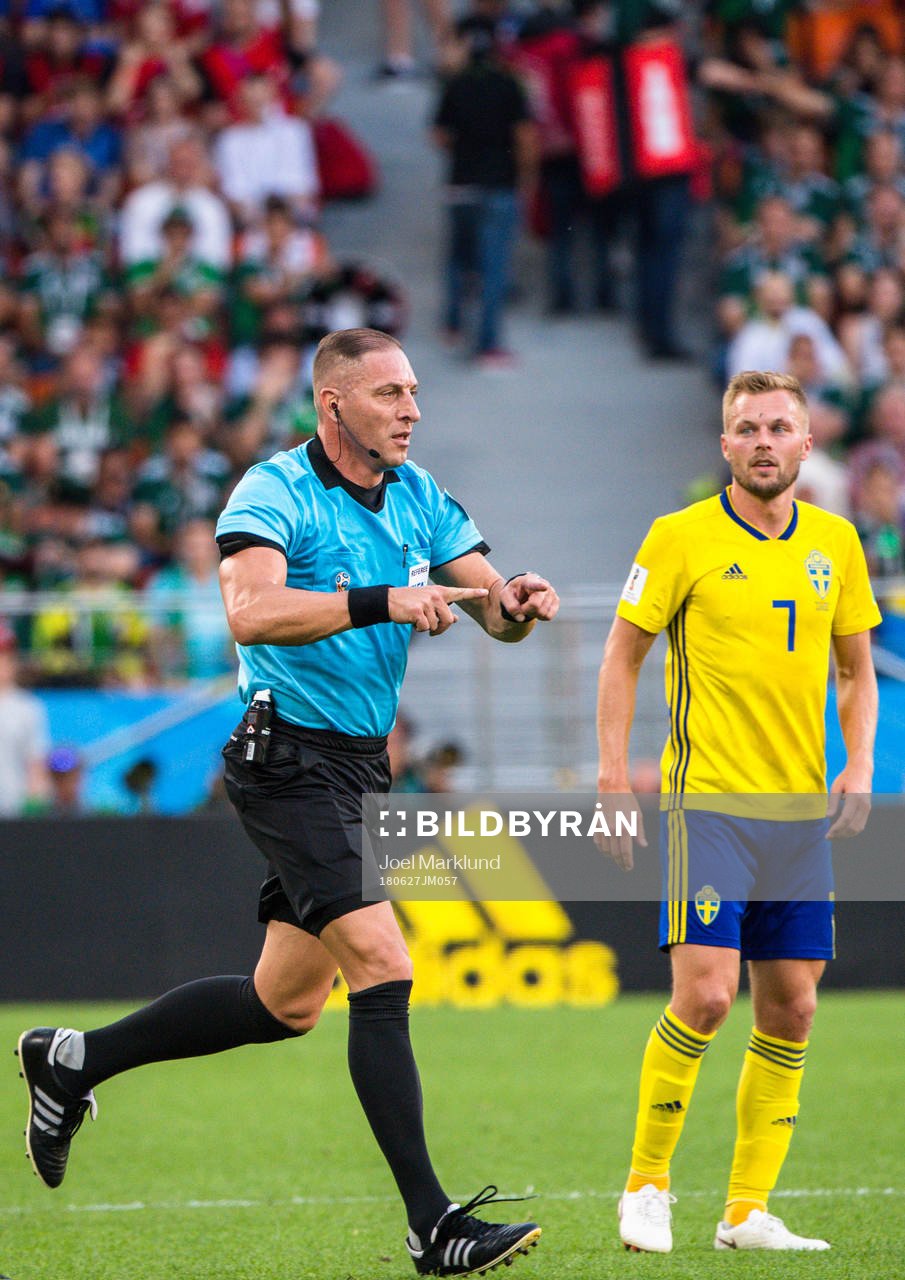 Referee Nestor Pitana with the sign for VAR