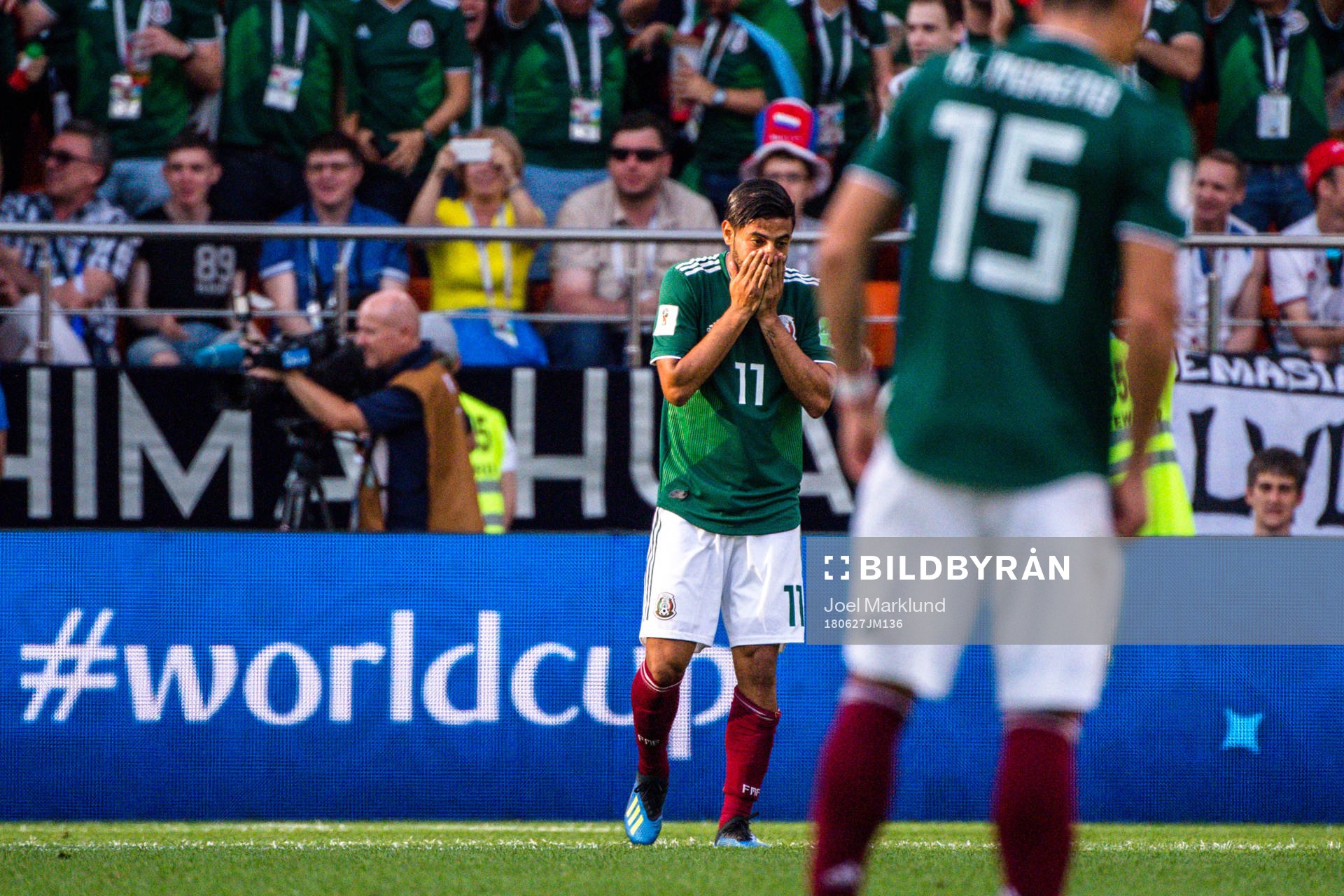 Carlos Vela of Mexico looks dejected
