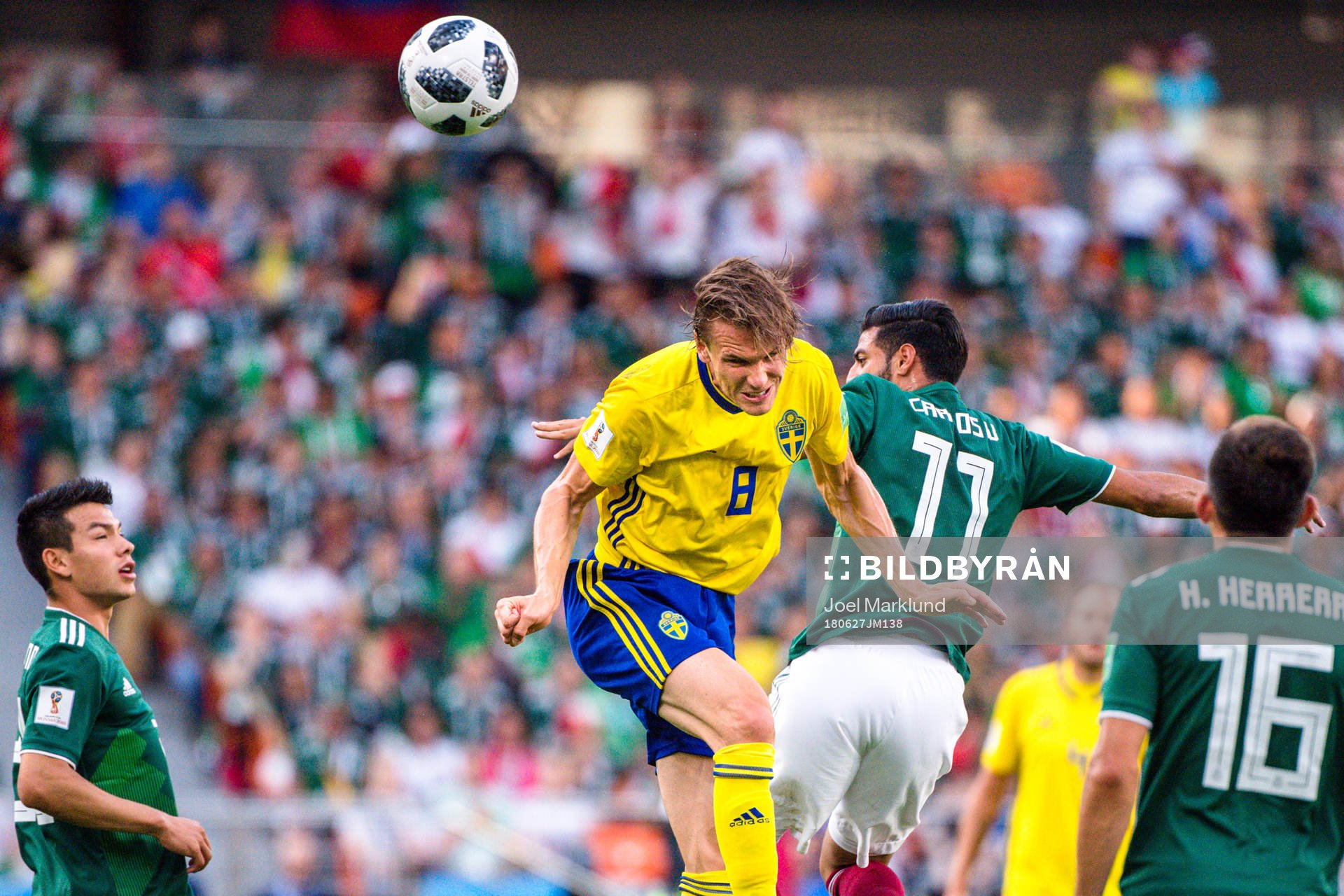 Albin Ekdal of Sweden and Carlos Vela  of Mexico
