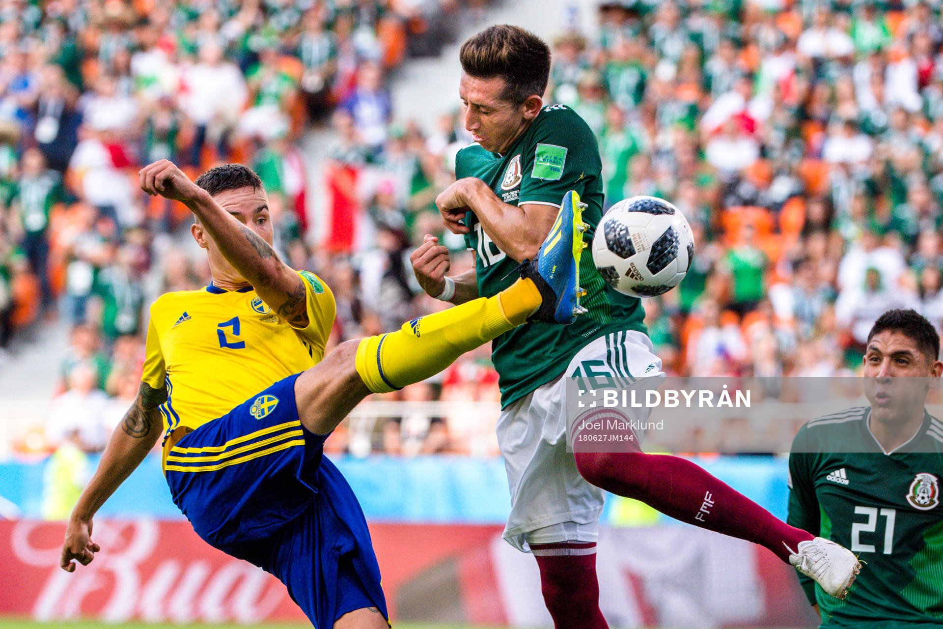 Mikael Lustig of Sweden and Hector Herrera of Mexico