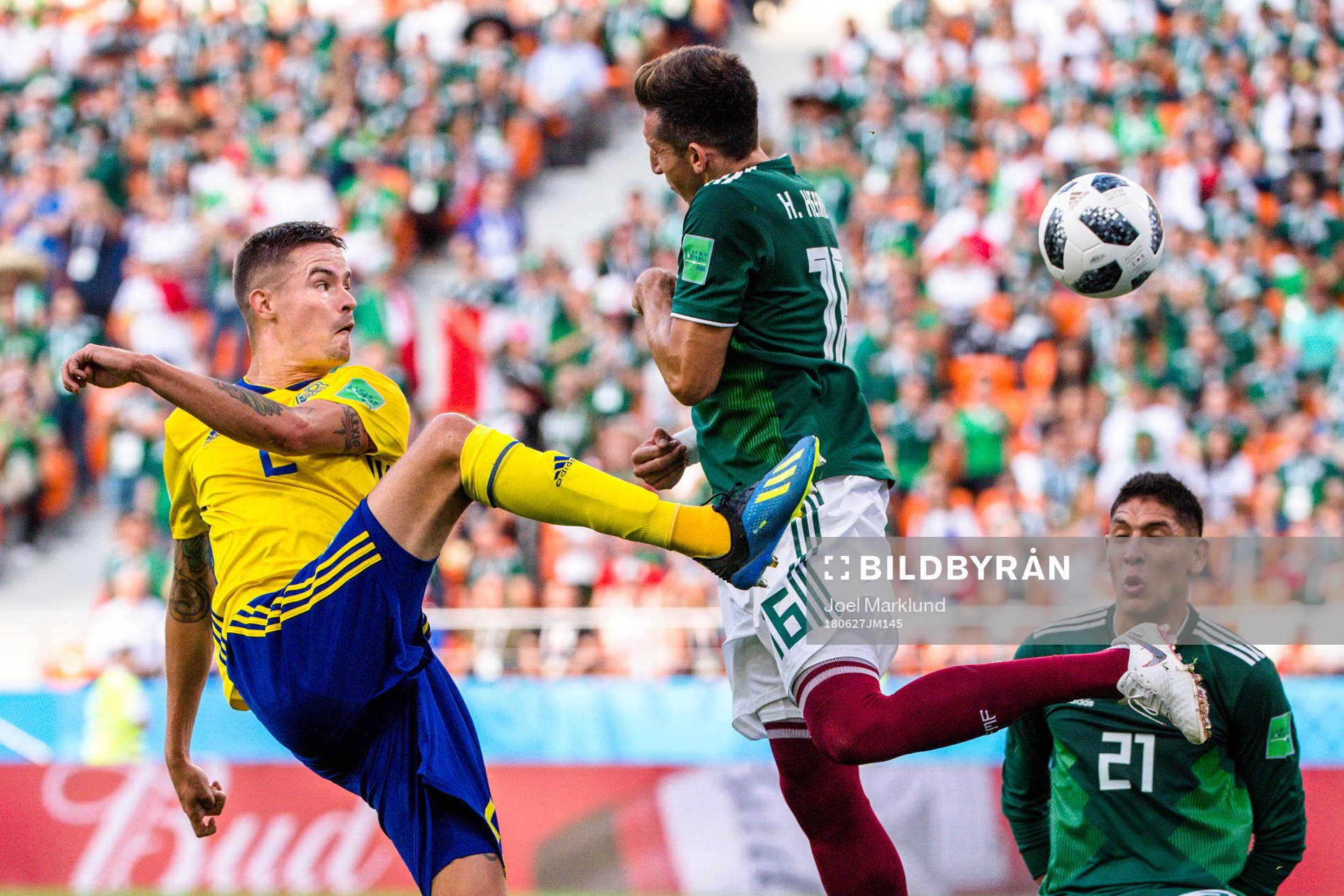 Mikael Lustig of Sweden and Hector Herrera of Mexico
