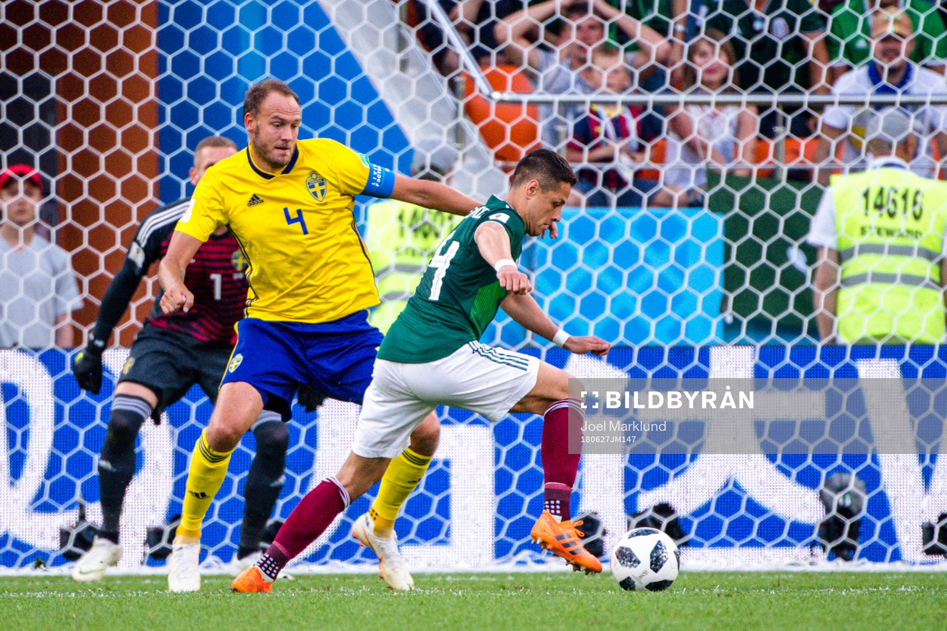 Andreas Granqvist of Sweden and Javier Hernandez  of Mexico