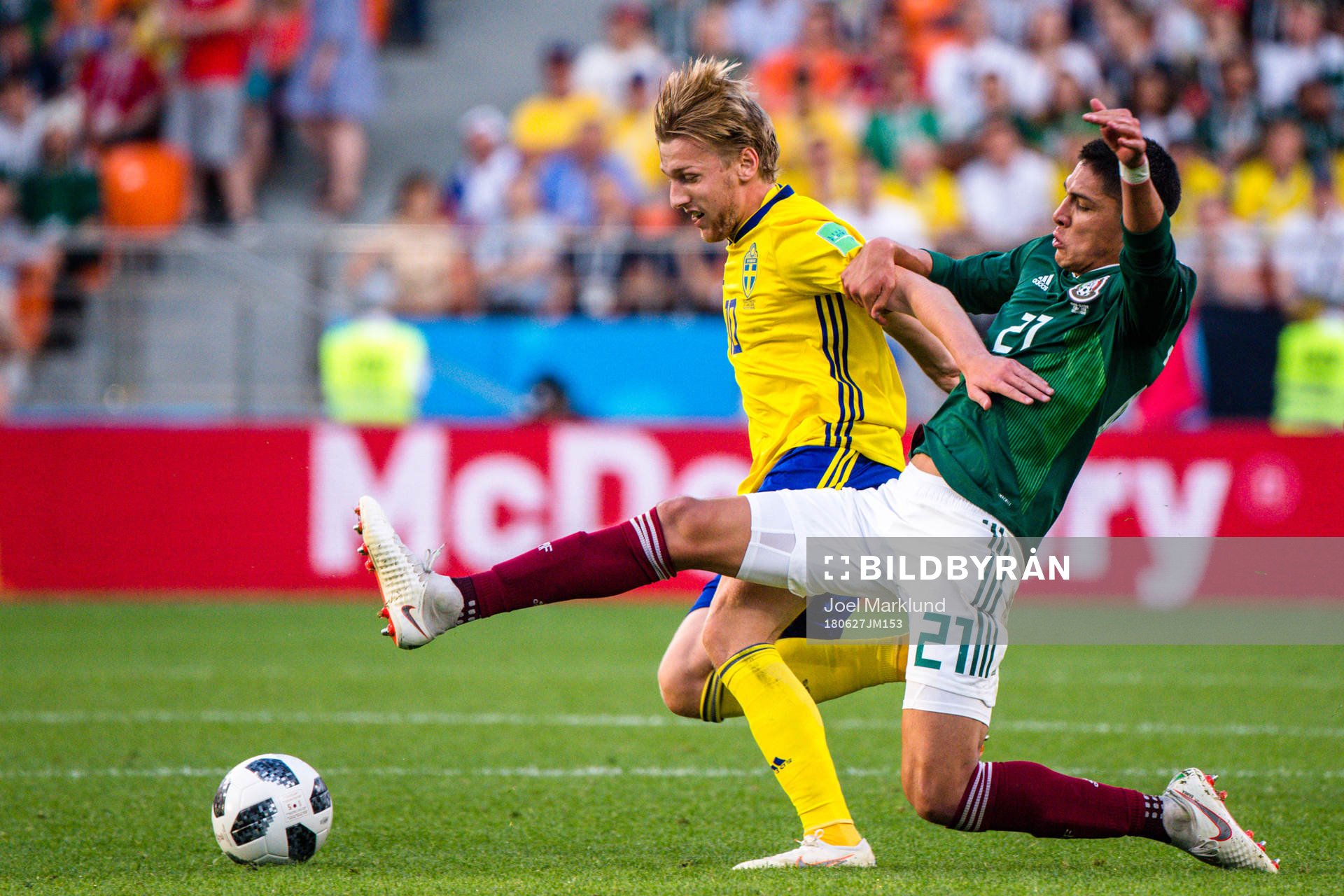 Emil Forsberg of Sweden and Edson Alvarez  of Mexico