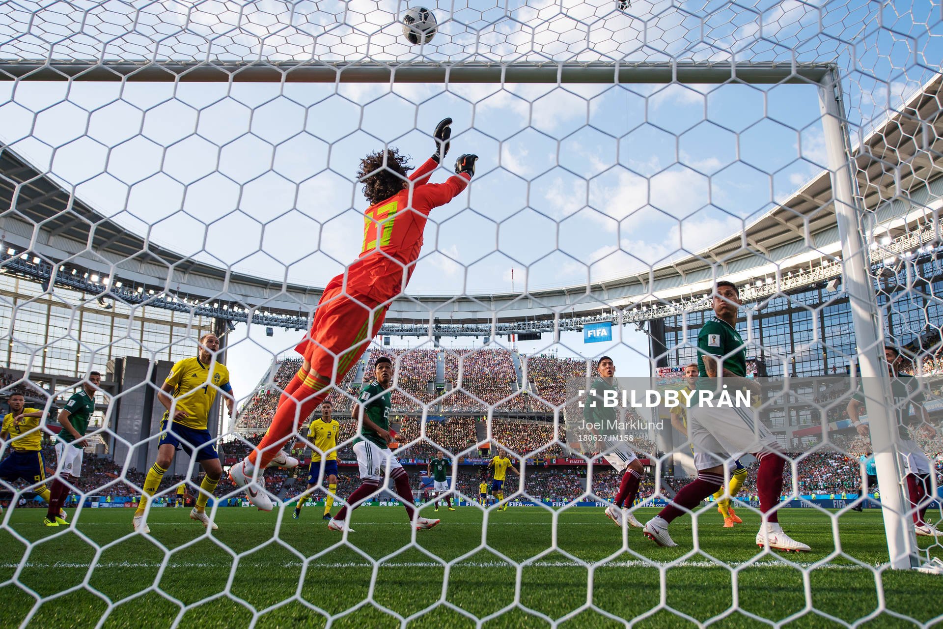 Goalkeeper Guillermo Ochoa of Mexico reaches for the ball