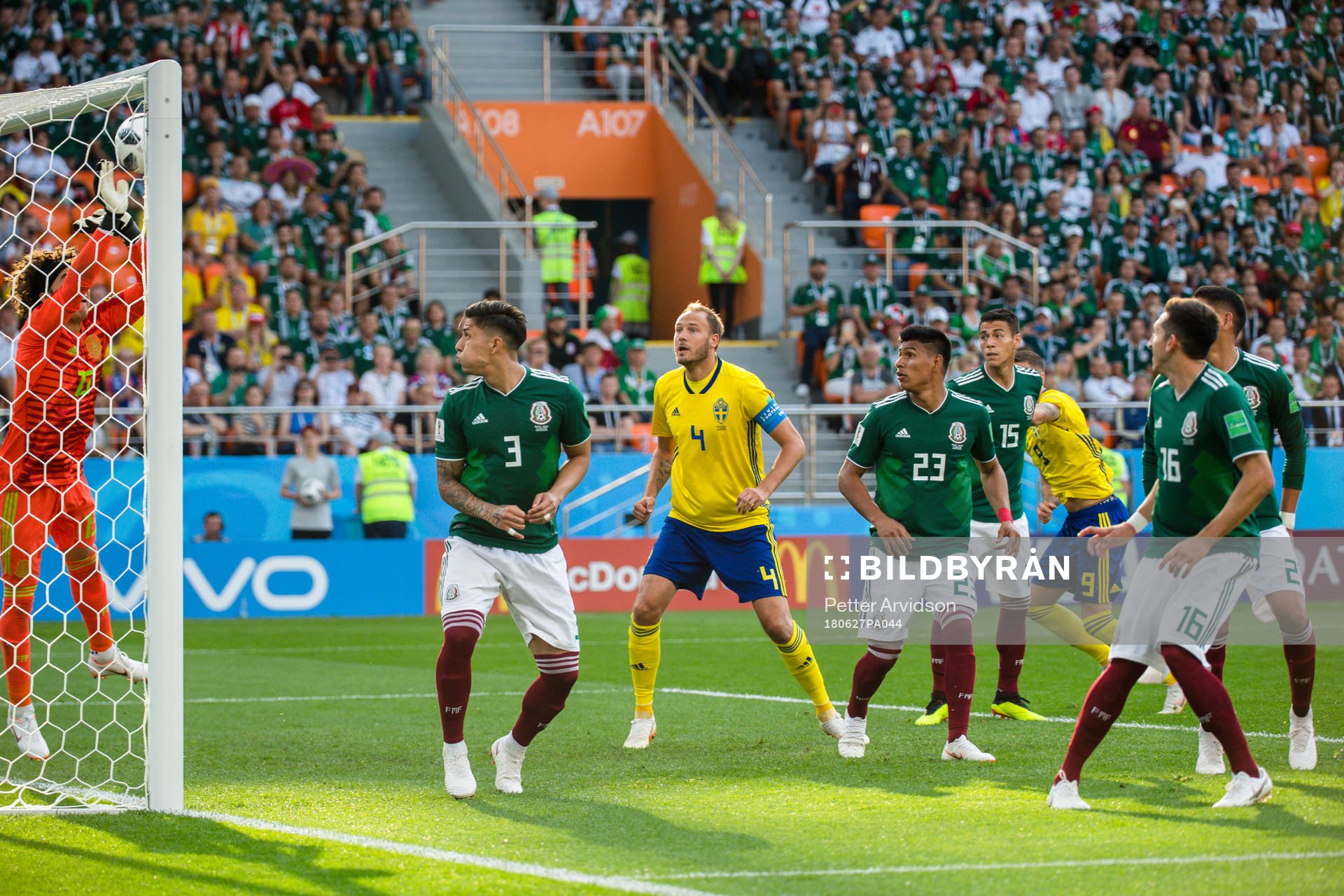 goalkeeper Guillermo Ochoa of Mexico  with a save  in front