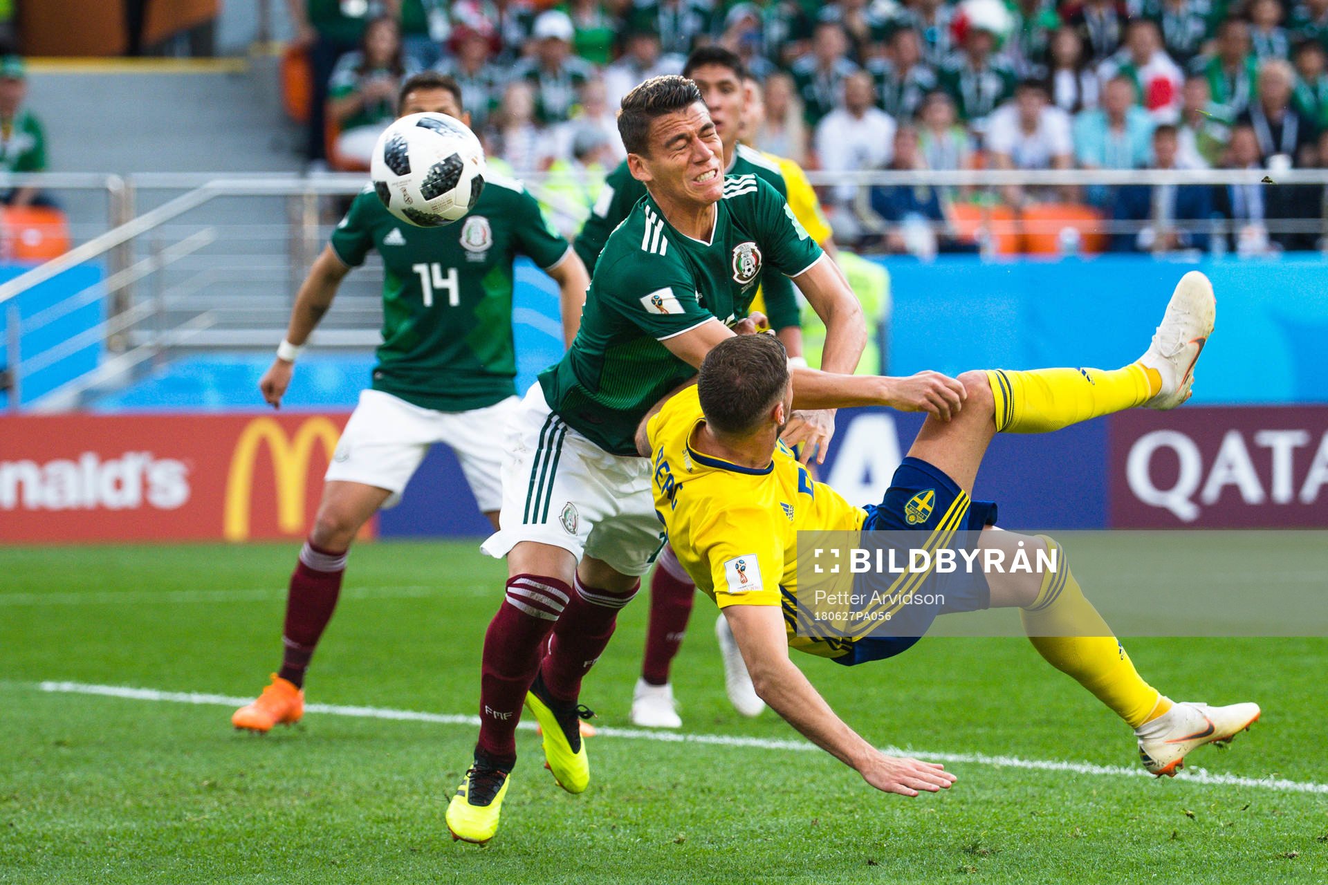 Rafael Marquez  of Mexico and Marcus Berg of Sweden