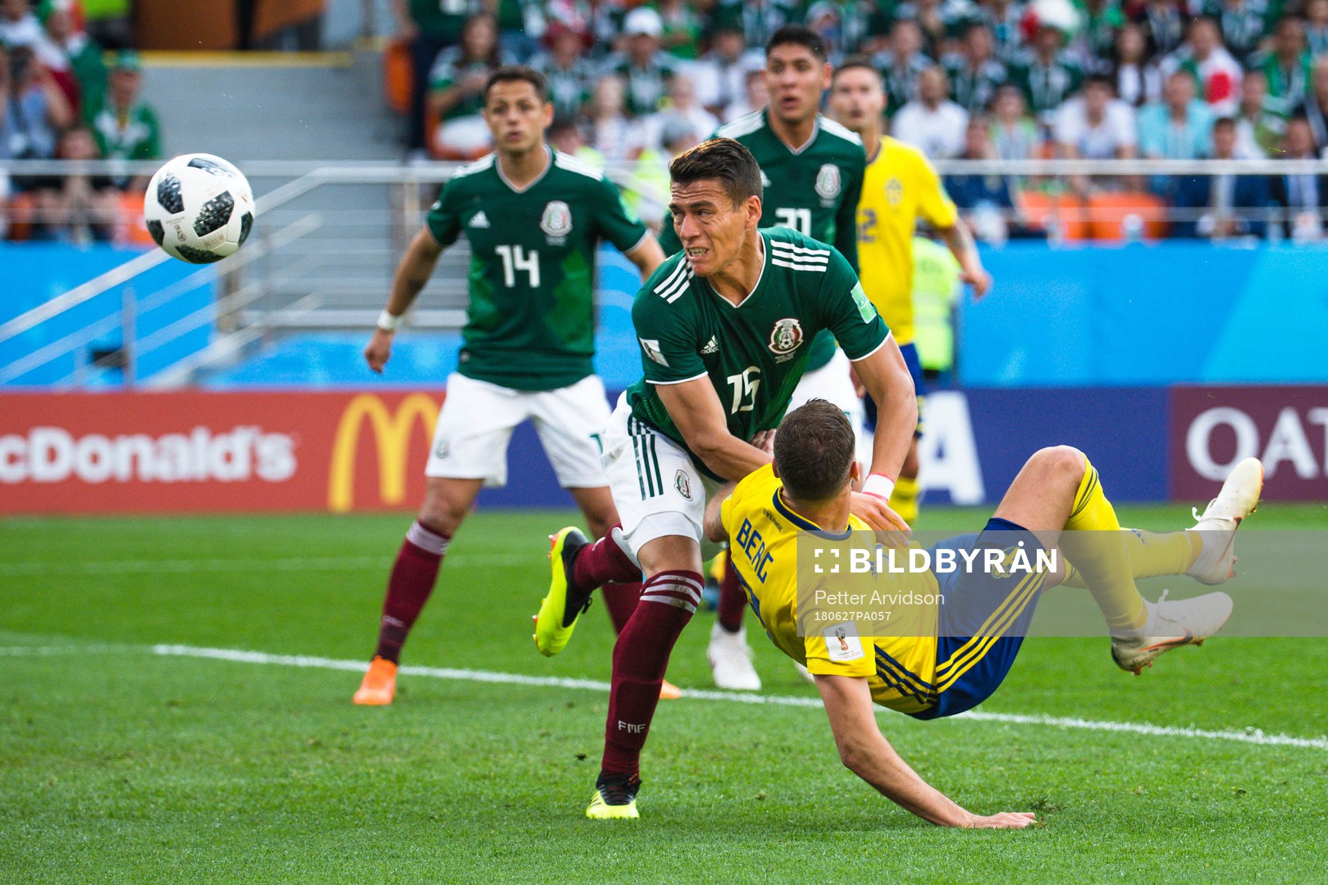 Rafael Marquez  of Mexico and Marcus Berg of Sweden