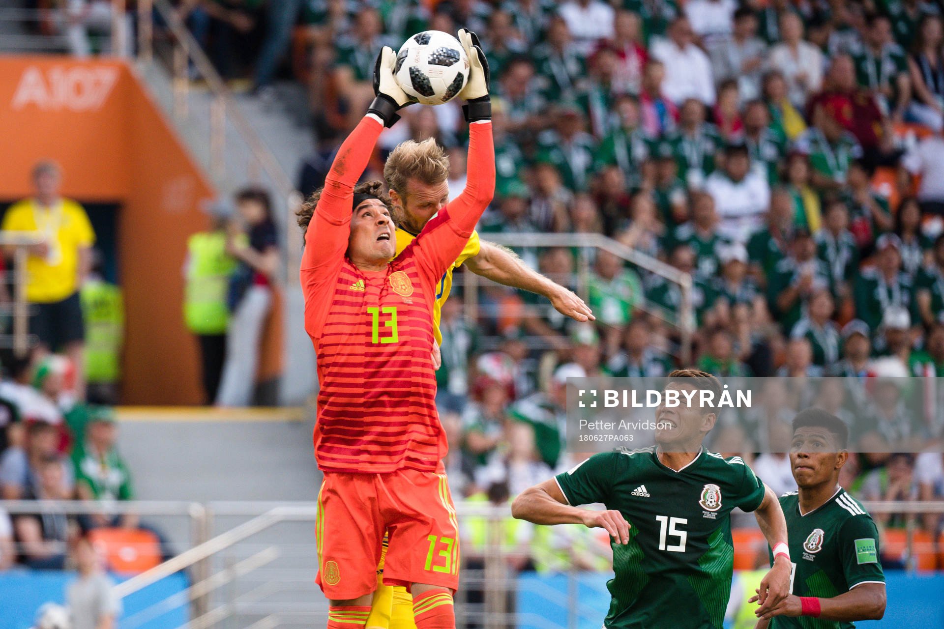 Ola Toivonen of Sweden against goalkeeper Guillermo Ochoa