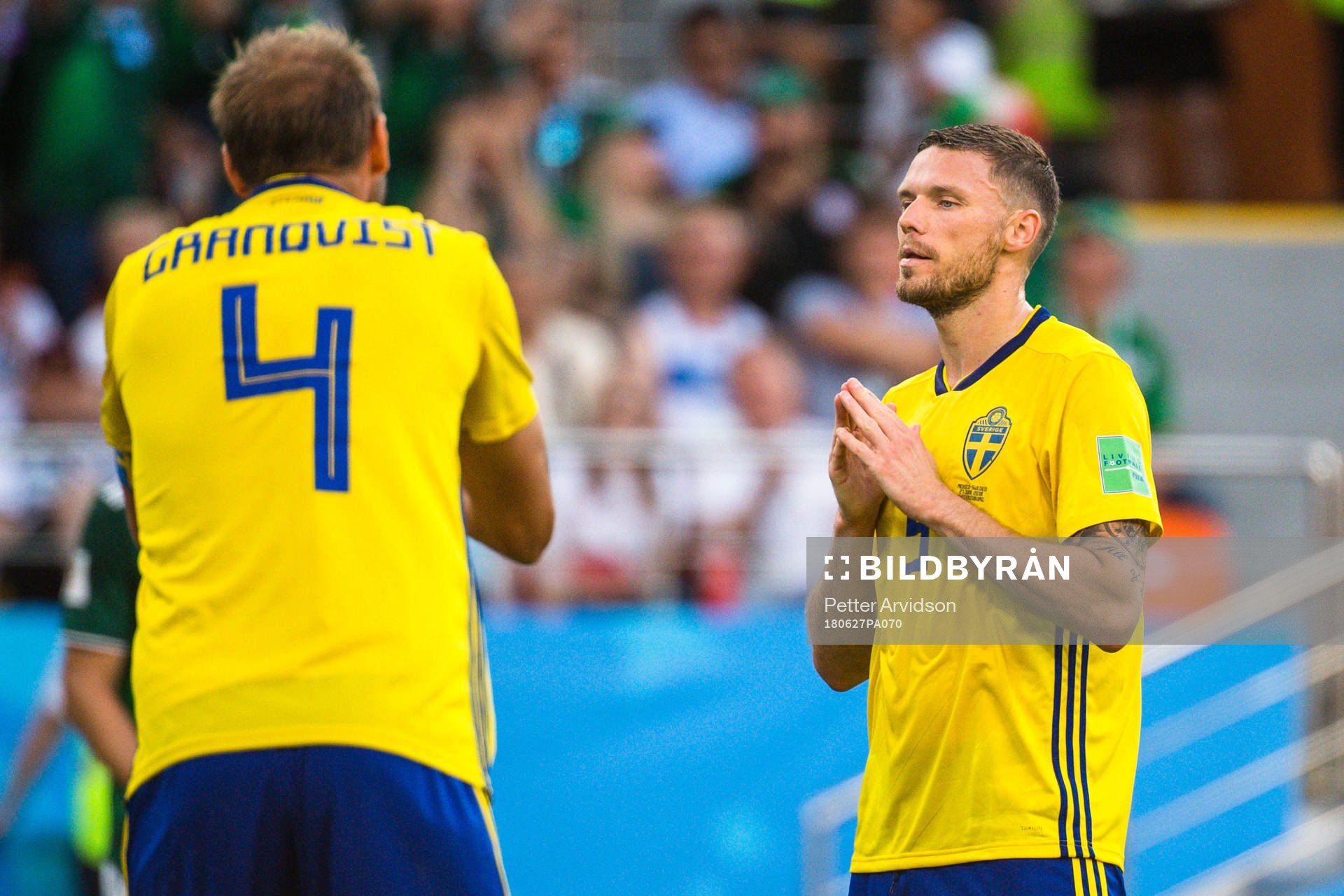 Andreas Granqvist and Marcus Berg of Sweden looks dejected
