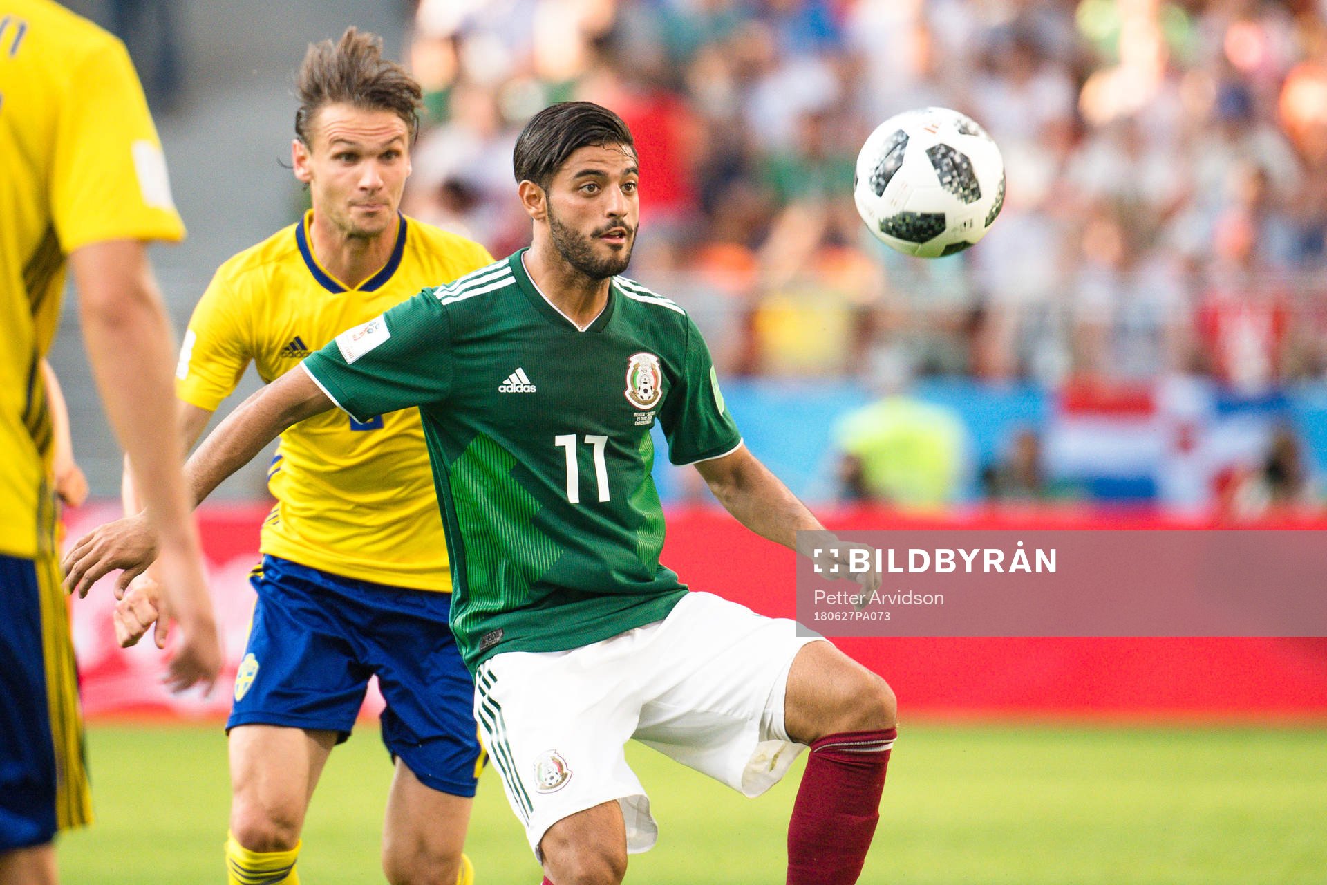 Albin Ekdal of Sweden and Carlos Vela  of Mexico
