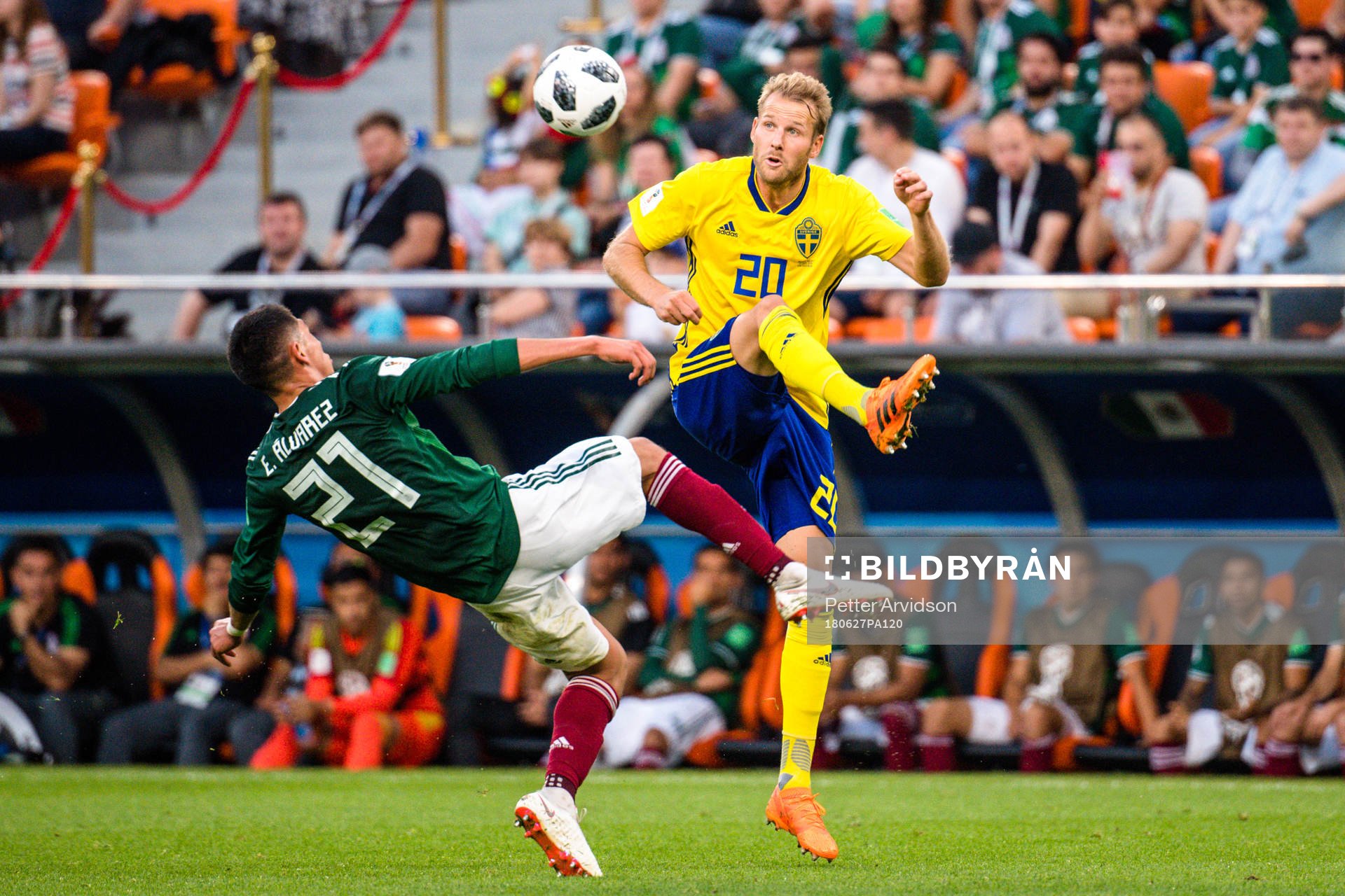 Edson Alvarez of Mexico and Ola Toivonen of Sweden