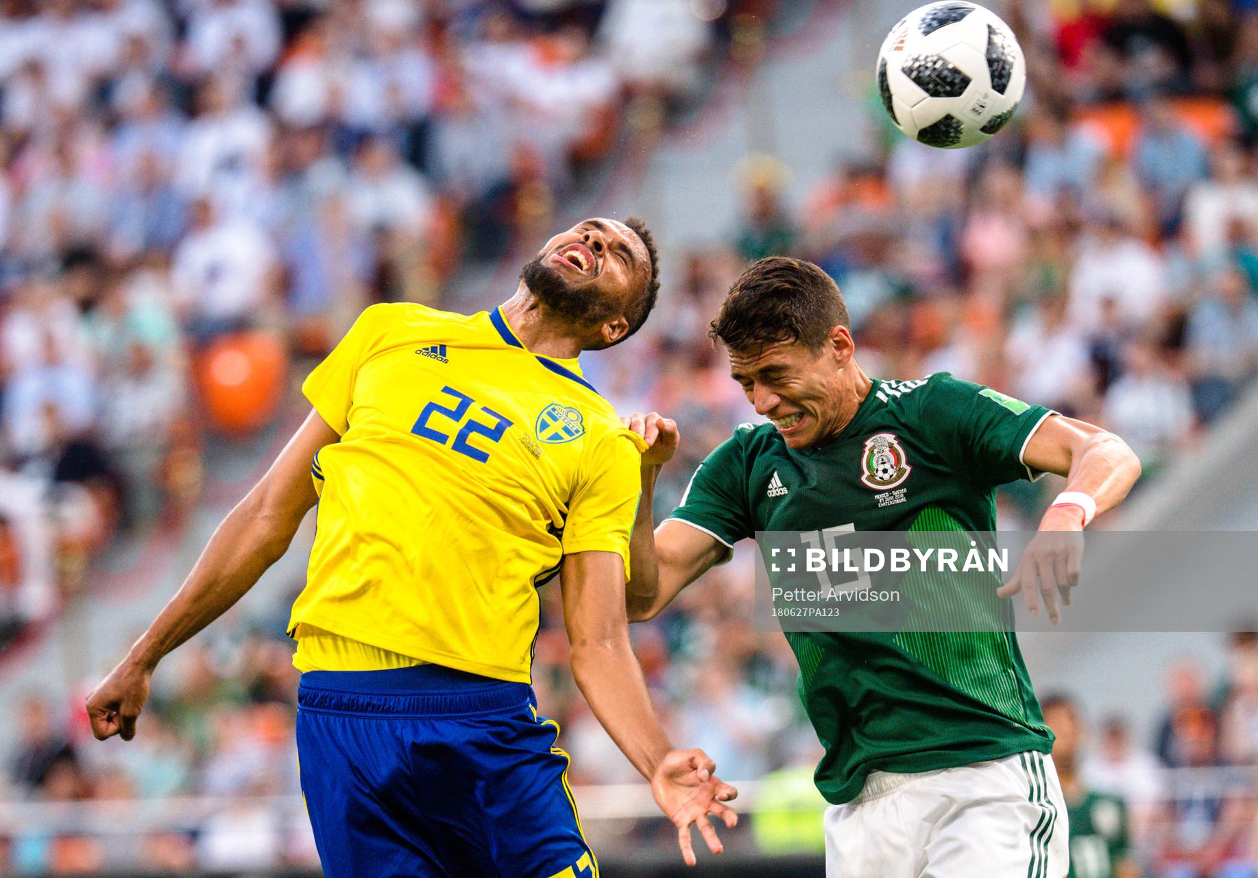 Isaac Kiese Thelin of Sweden and Hector Moreno of Mexico