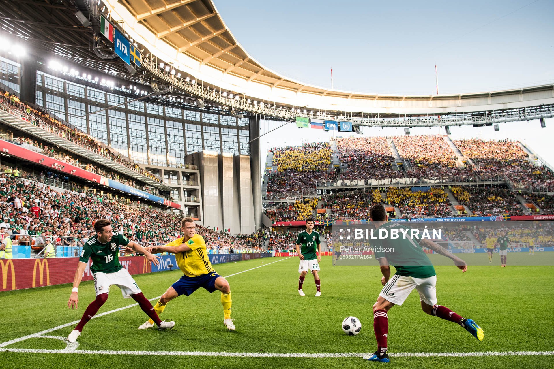 Viktor Claesson of Sweden in action with Hector Herrera and