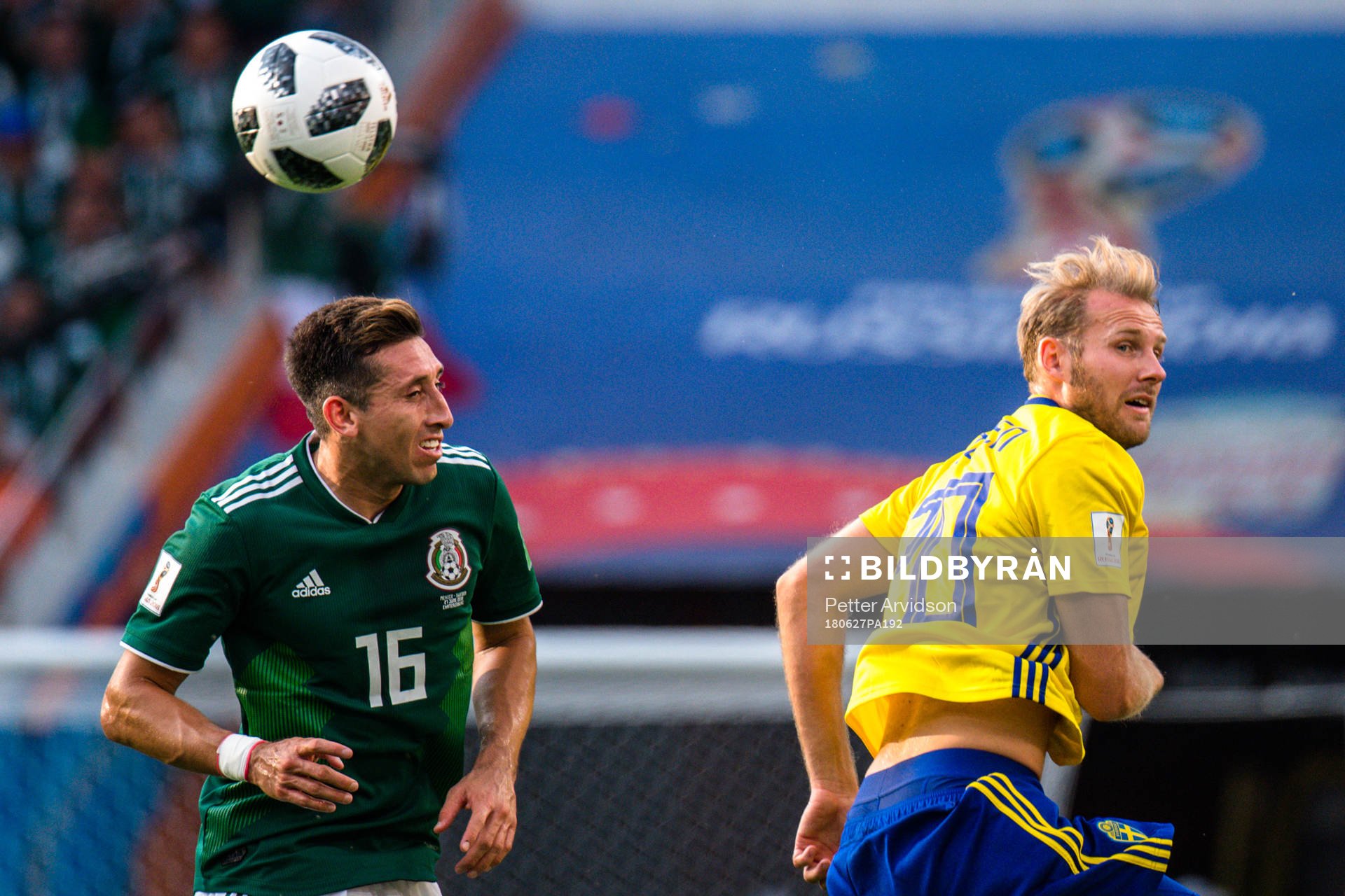 Hector Herrera of Mexico and Ola Toivonen of Sweden