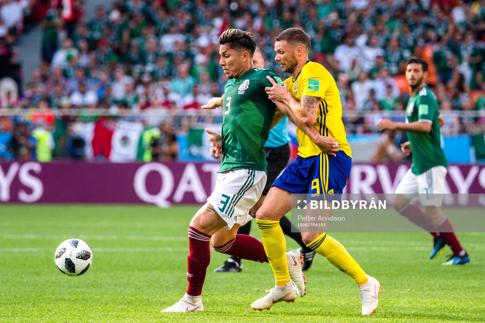 Carlos Salcedo  of Mexico and Marcus Berg of Sweden