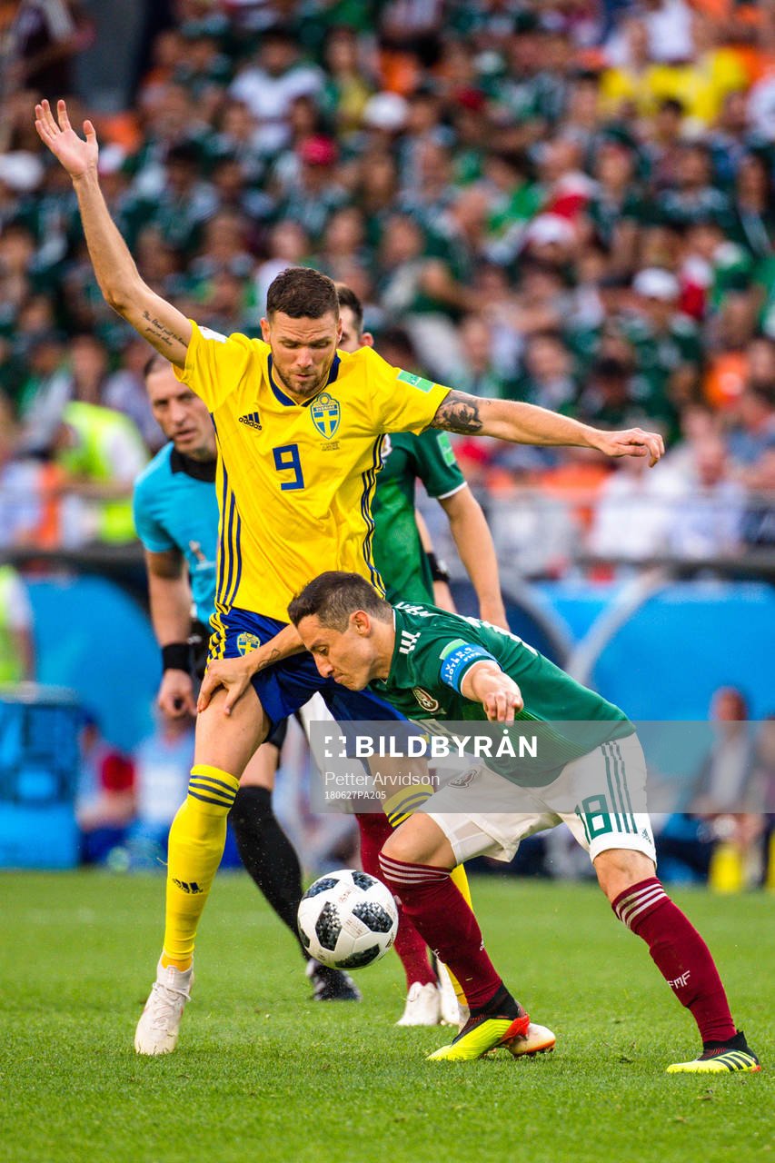 Andres Guardado of Mexico and Marcus Berg of Sweden during the FIFA World Cup group stage match between Mexico and Sweden on June 27, 2018 in Ekaterinburg.