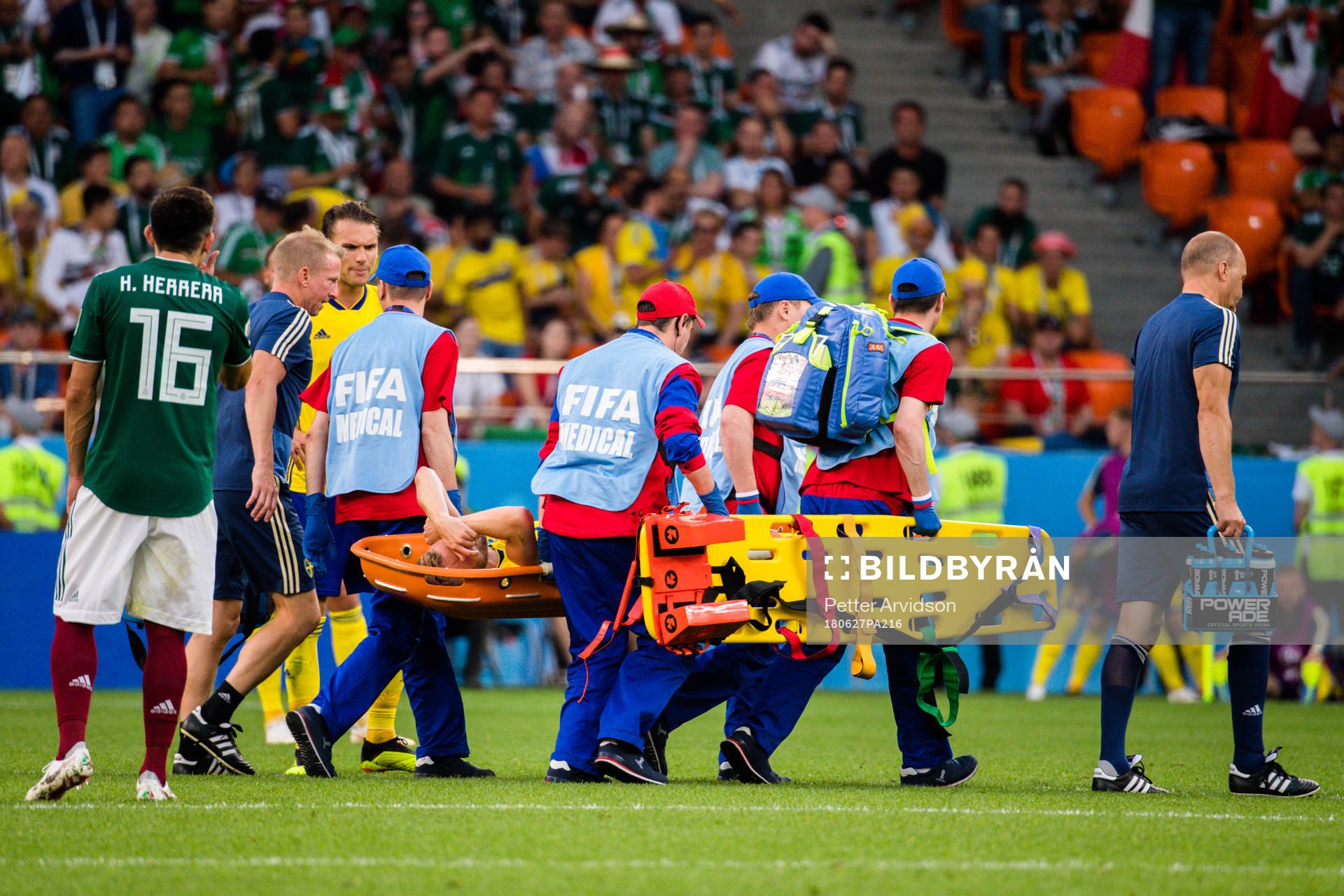 Sebastian Larsson of Sweden leaves the pitch with a injury