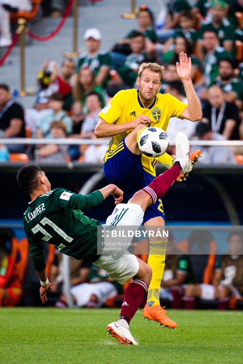Ola Toivonen of Sweden and Edson Alvarez  of Mexico