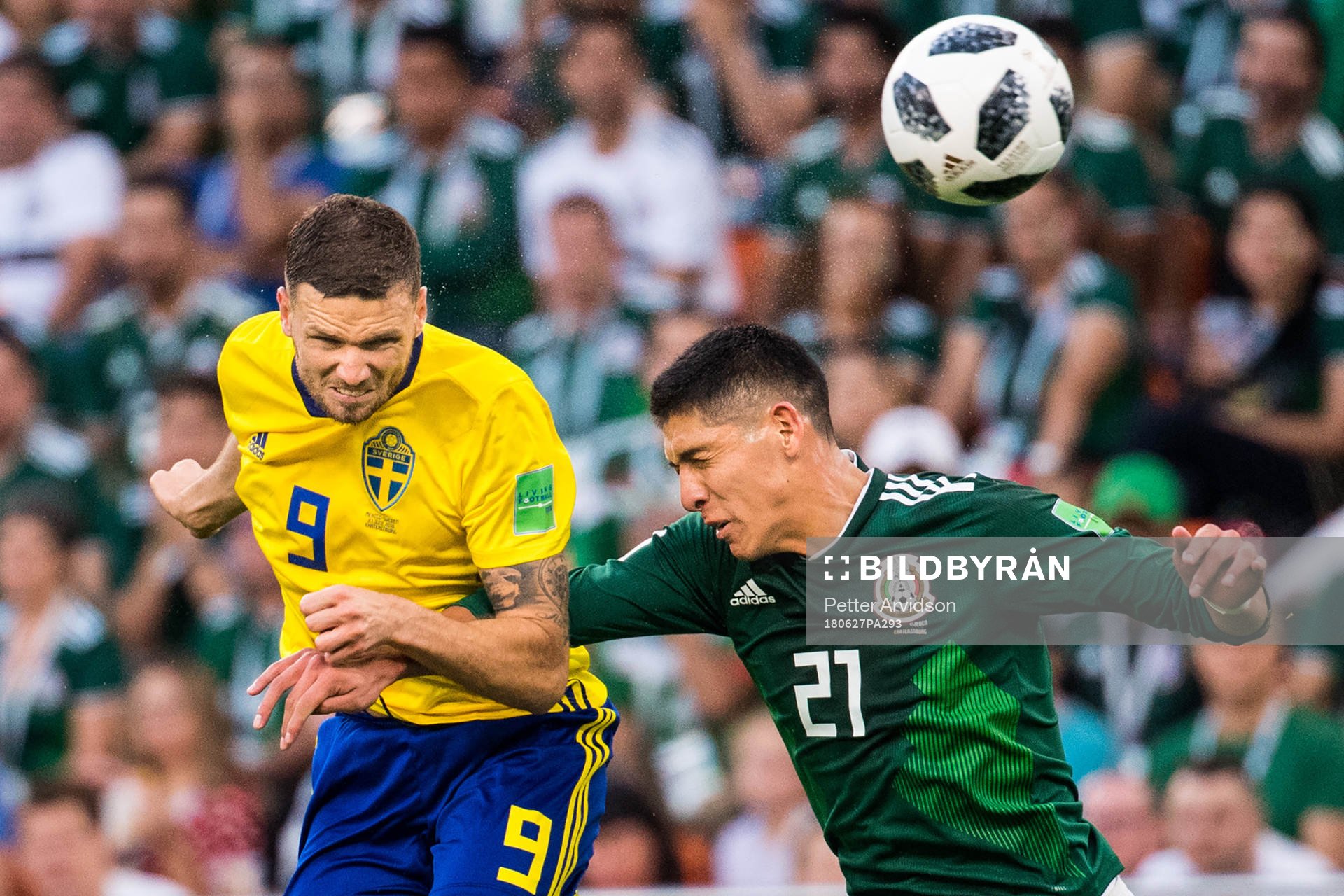 Marcus Berg of Sweden and Edson Alvarez of Mexico