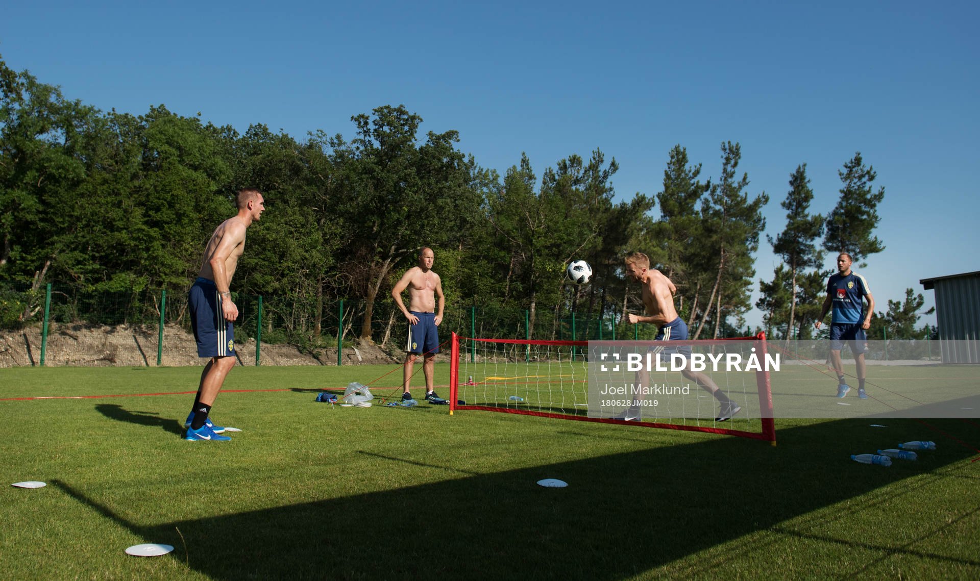 Robin Olsen, Andreas Granqvist and Sebastian Larsson of the Swedish national football team play football tennis during the FIFA World Cup on June 28, 2018 in Gelendzhik.