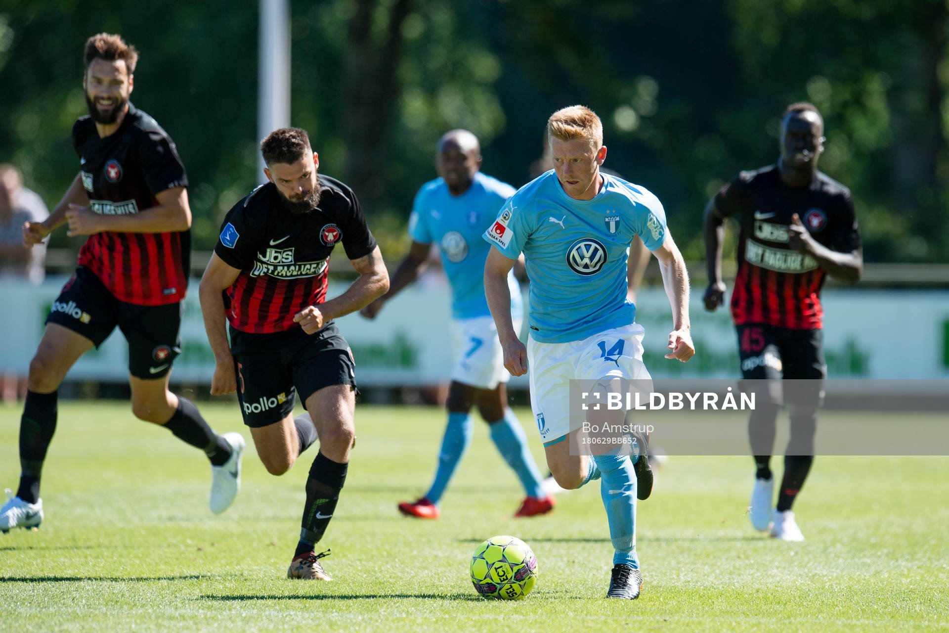 Malmö FFs Anders Christiansen with the ball against Midtjyllands Marc Dal Hende in a friendly game between FC Midtjylland and Malmo June 29, 2018 in Herning, Denmark. FC Midtjylland-Malmö FF ends 2-1.