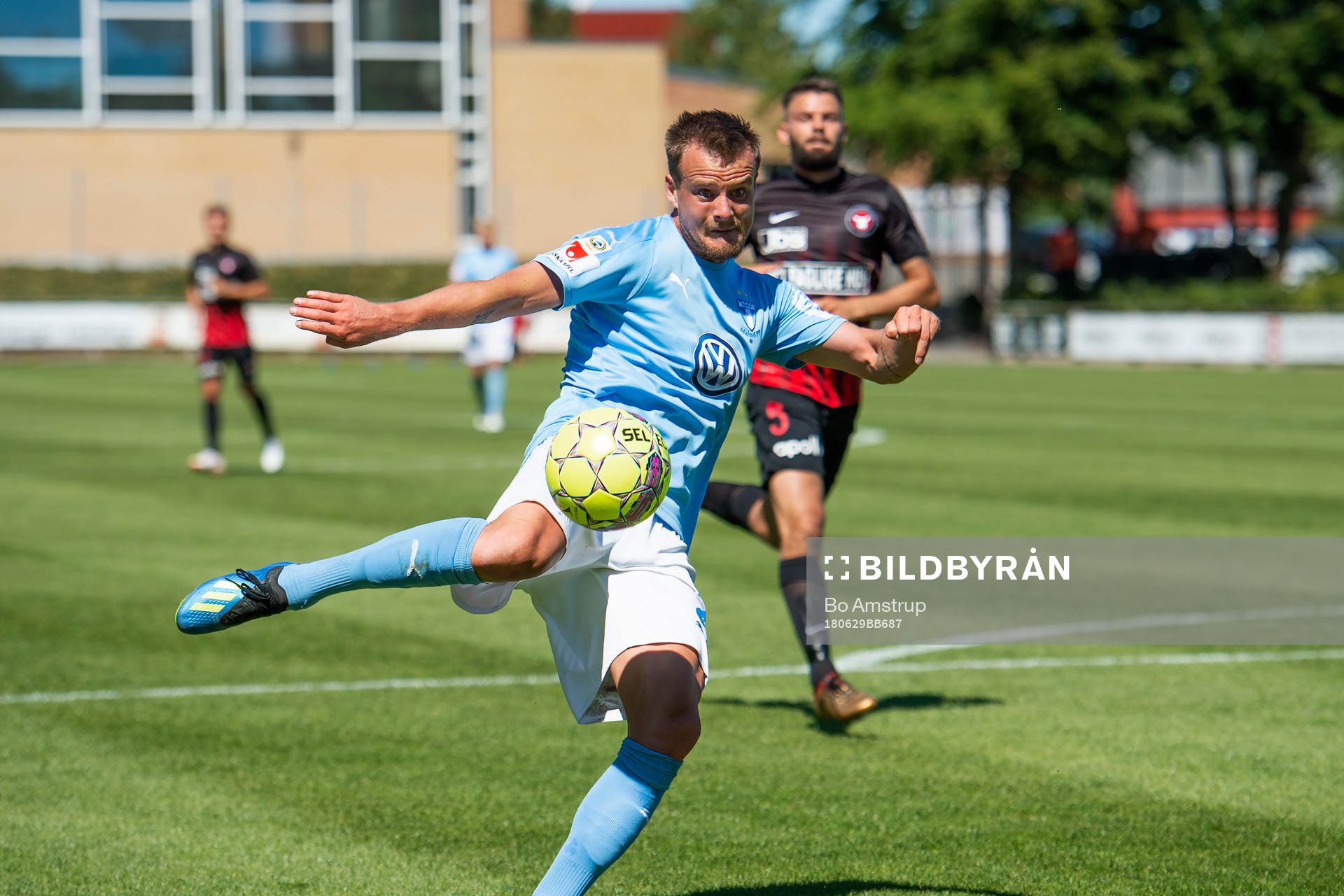 Malmö FFs Eric Larsson with the ball against Midtjyllands