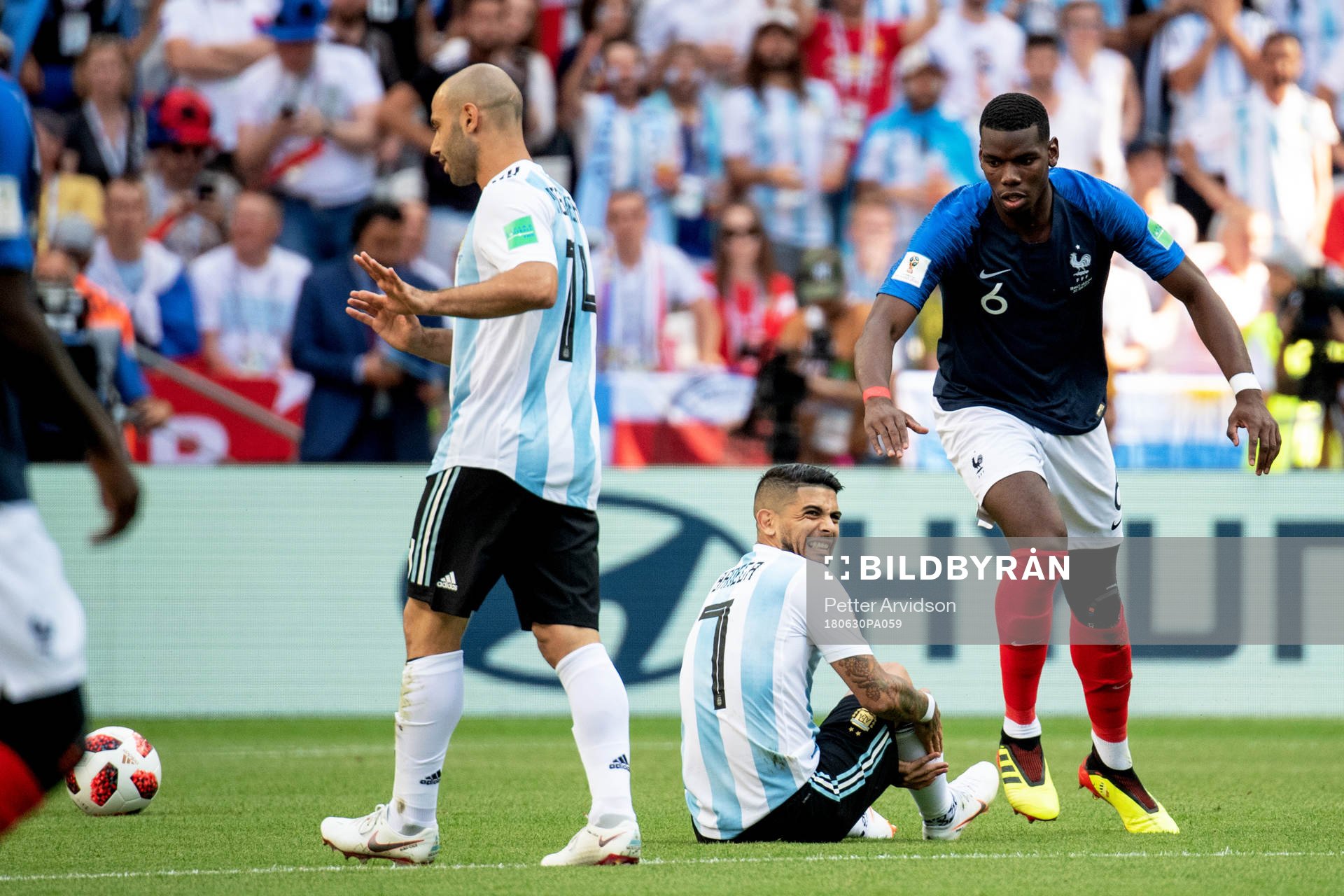 Paul Pogba of France and Ever Banega of Argentina
