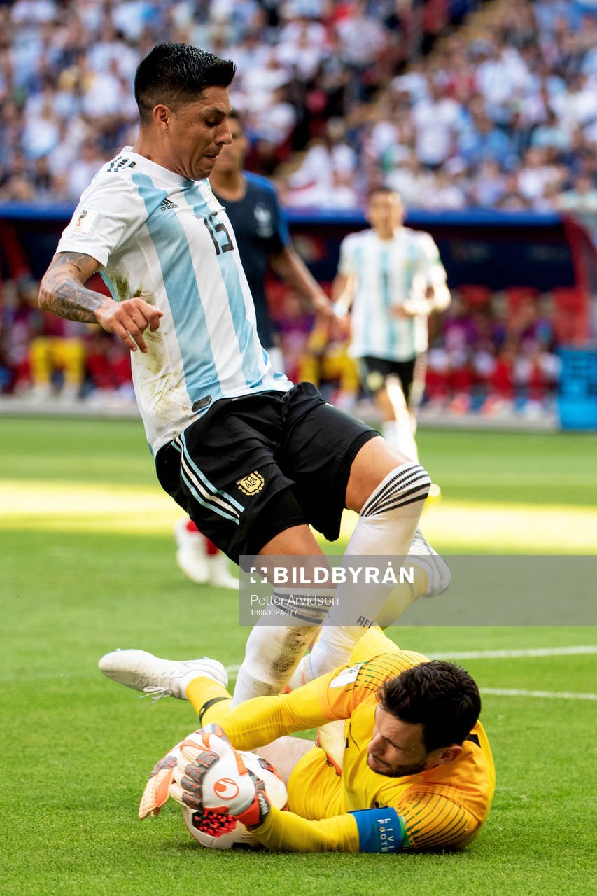Enzo Perez of Argentina and goalkeeper Hugo Lloris of France