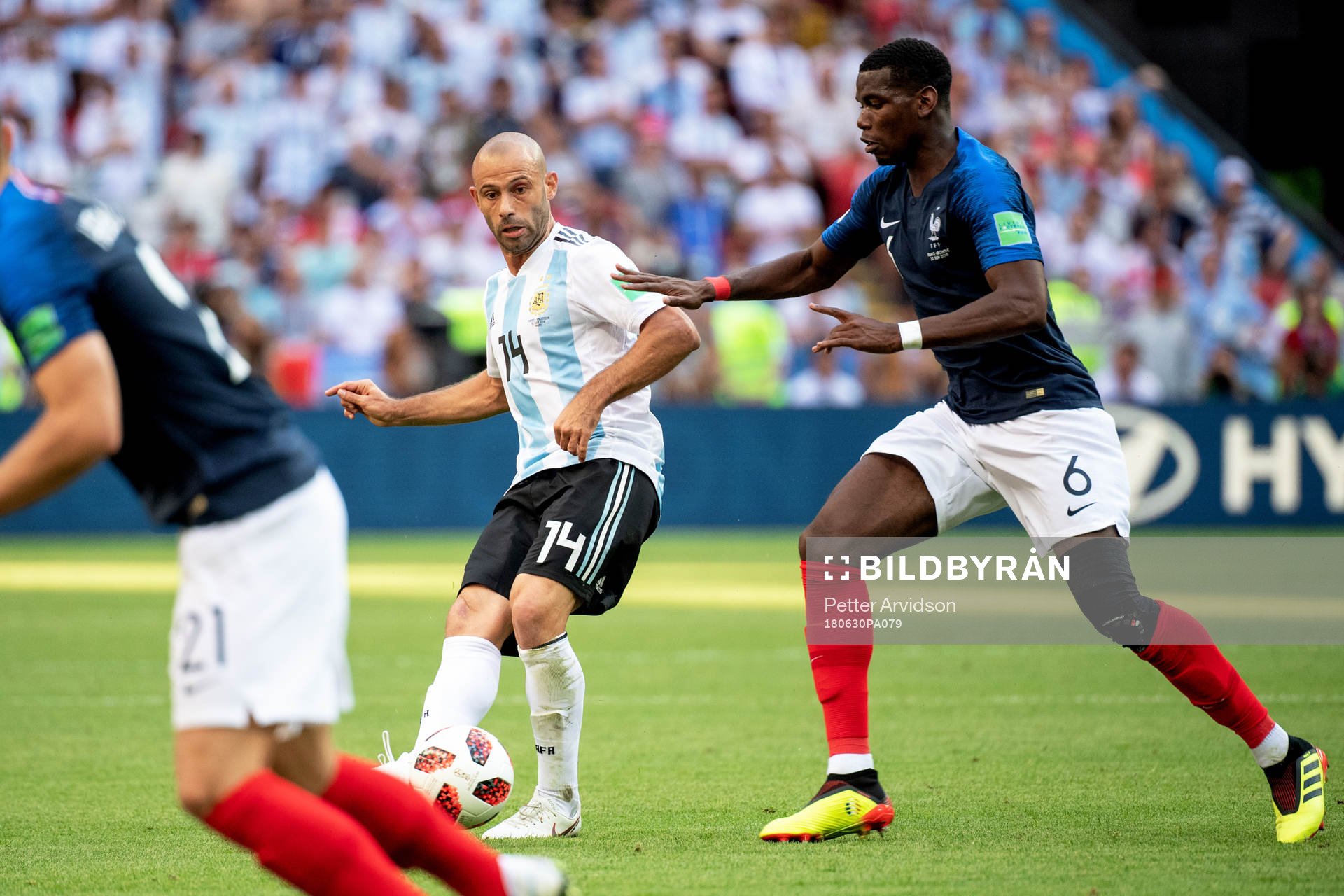 Javier Mascherano of Argentina and Paul Pogba of France