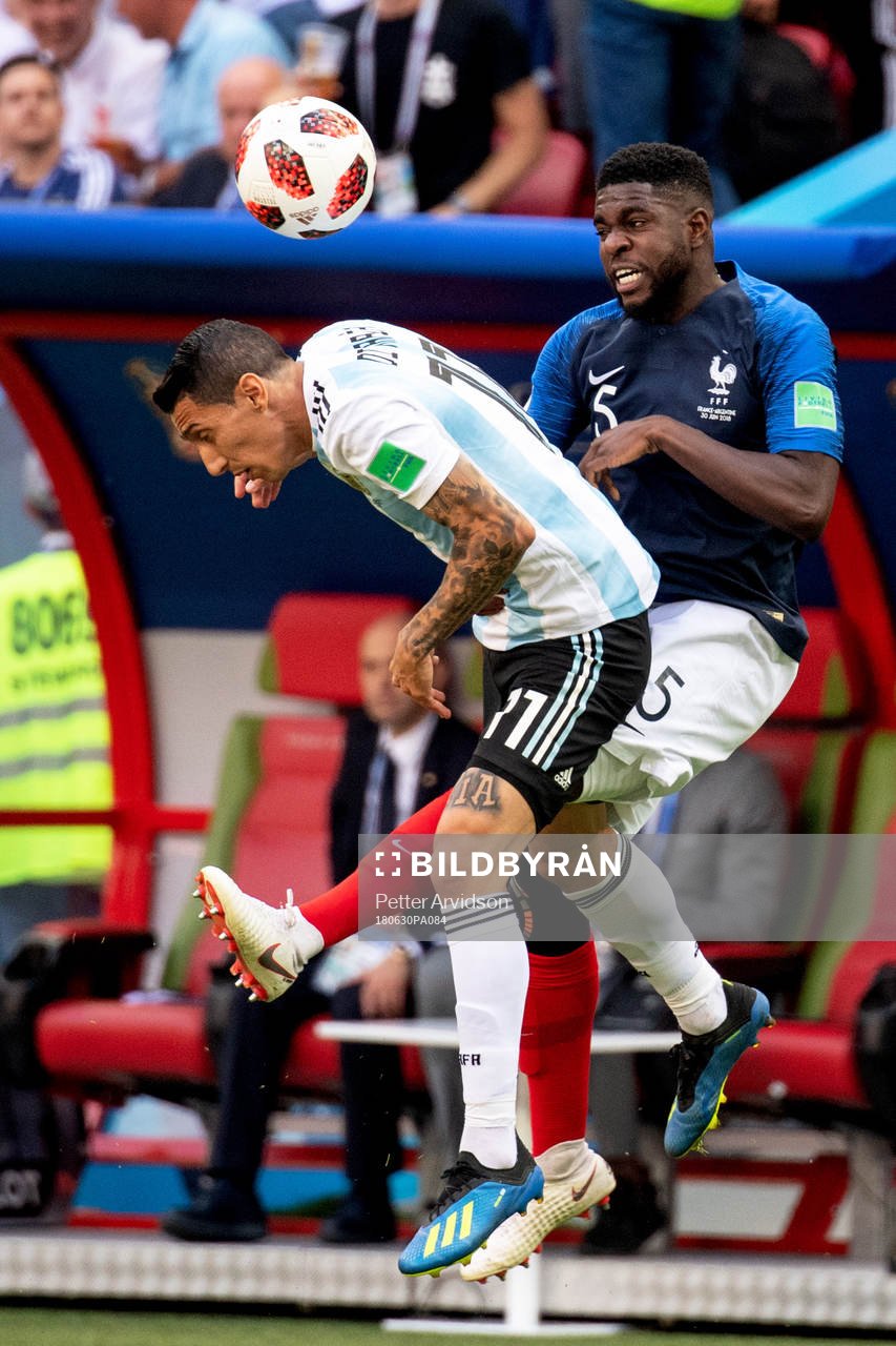 Angel Di Maria of Argentina and Samuel Umtiti of France