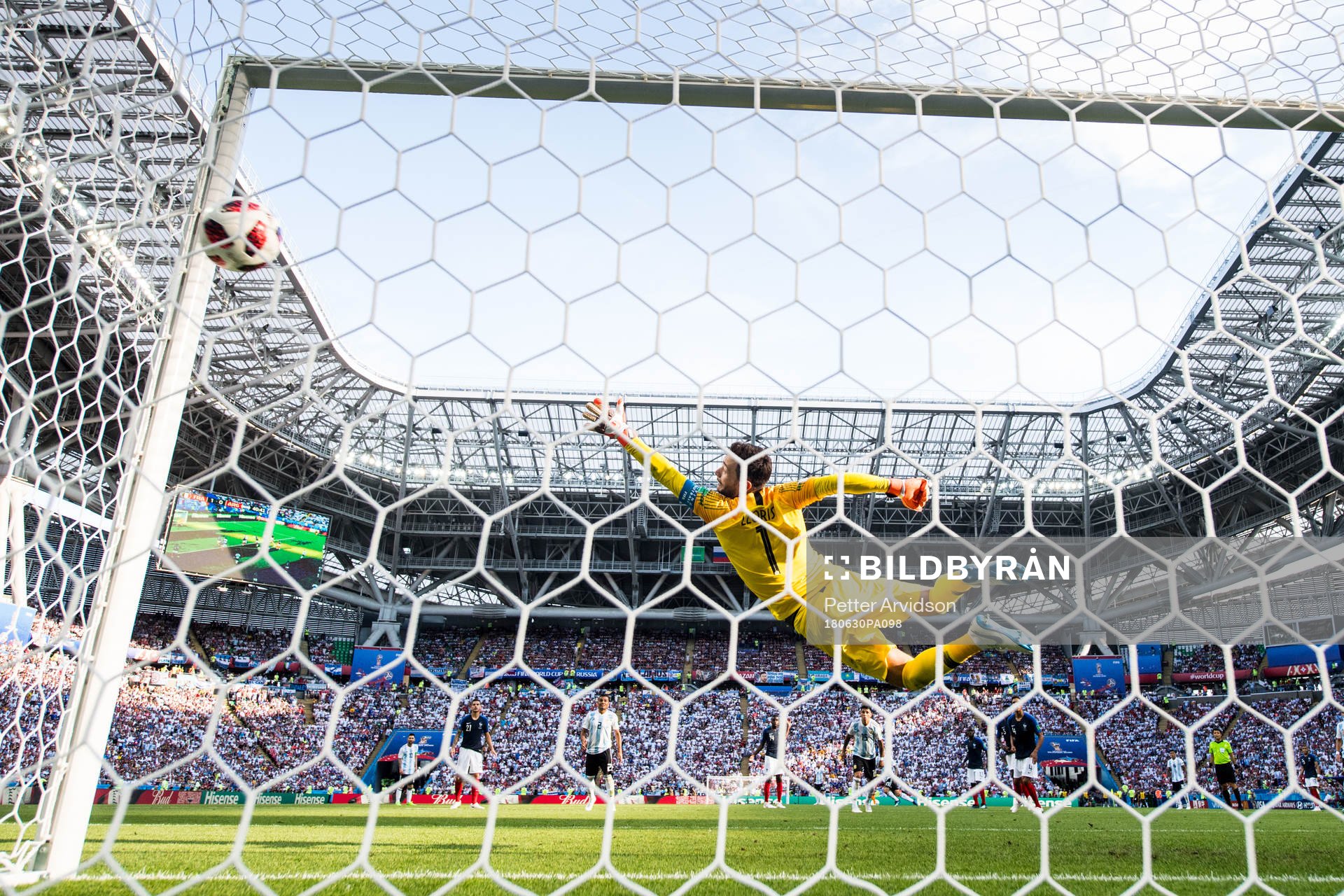 Angel Di Maria of Argentina scores 1-1 behind goalkeeper