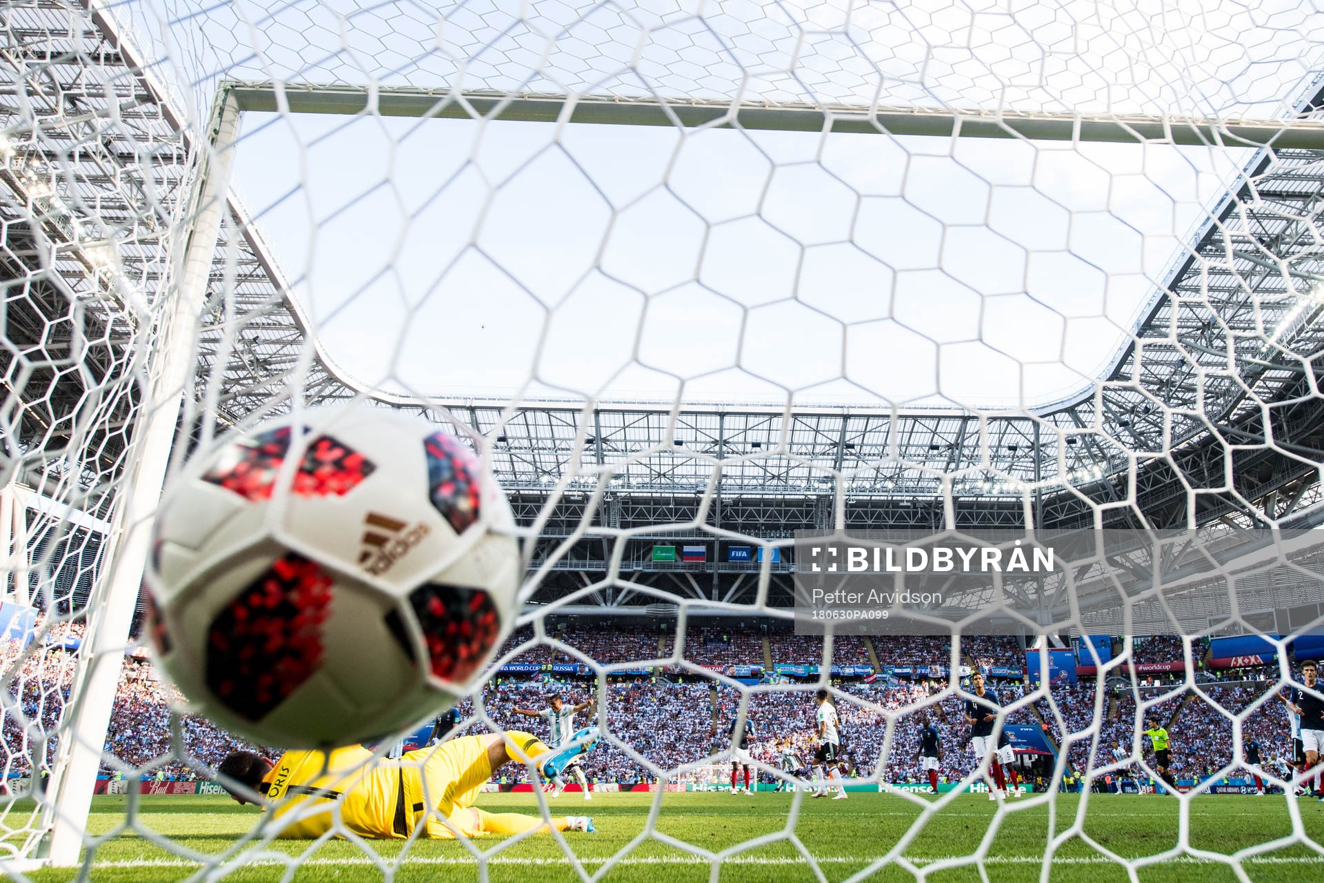 Angel Di Maria of Argentina scores 1-1 behind goalkeeper