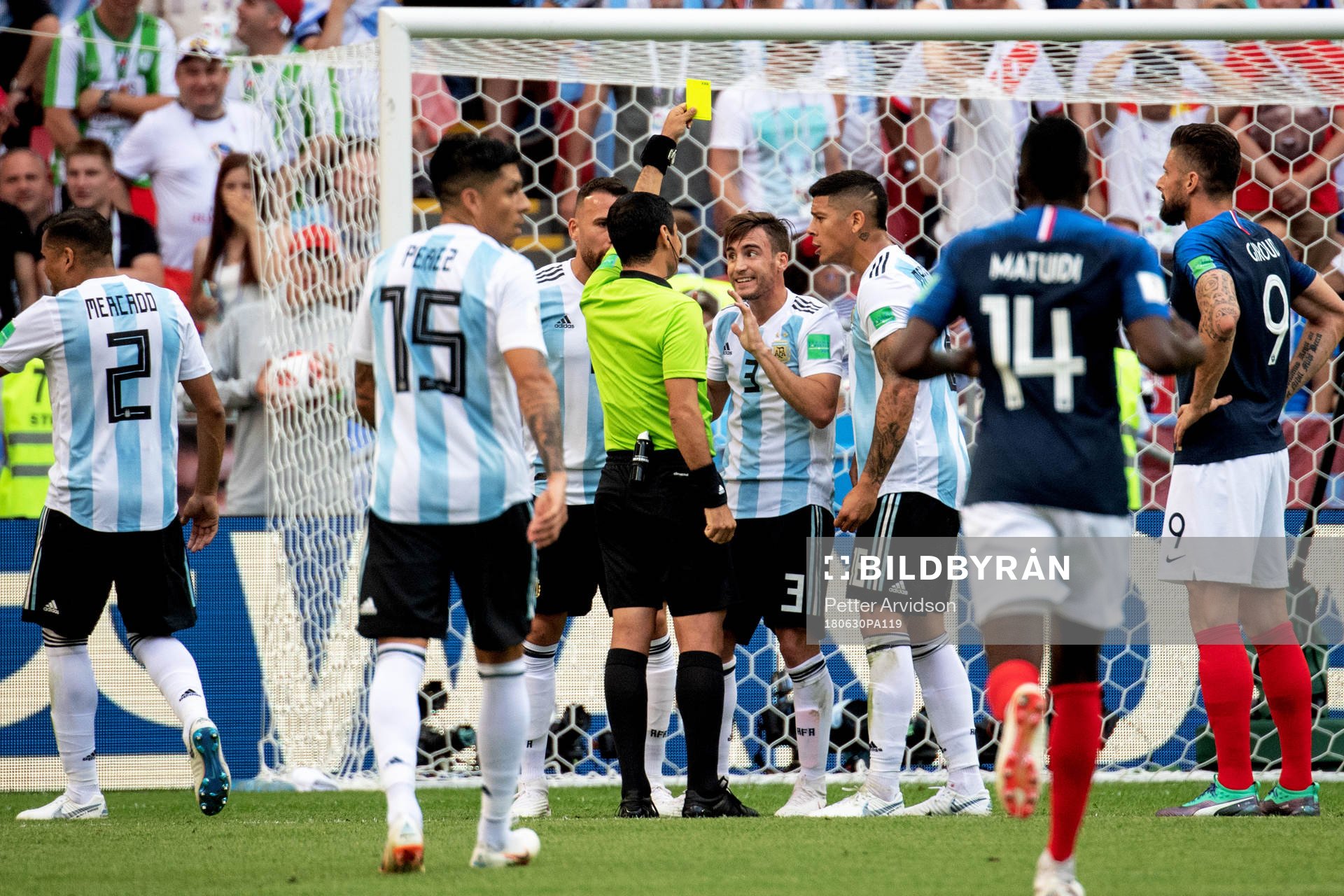 Nicolas Tagliafico of Argentina gets yellow card