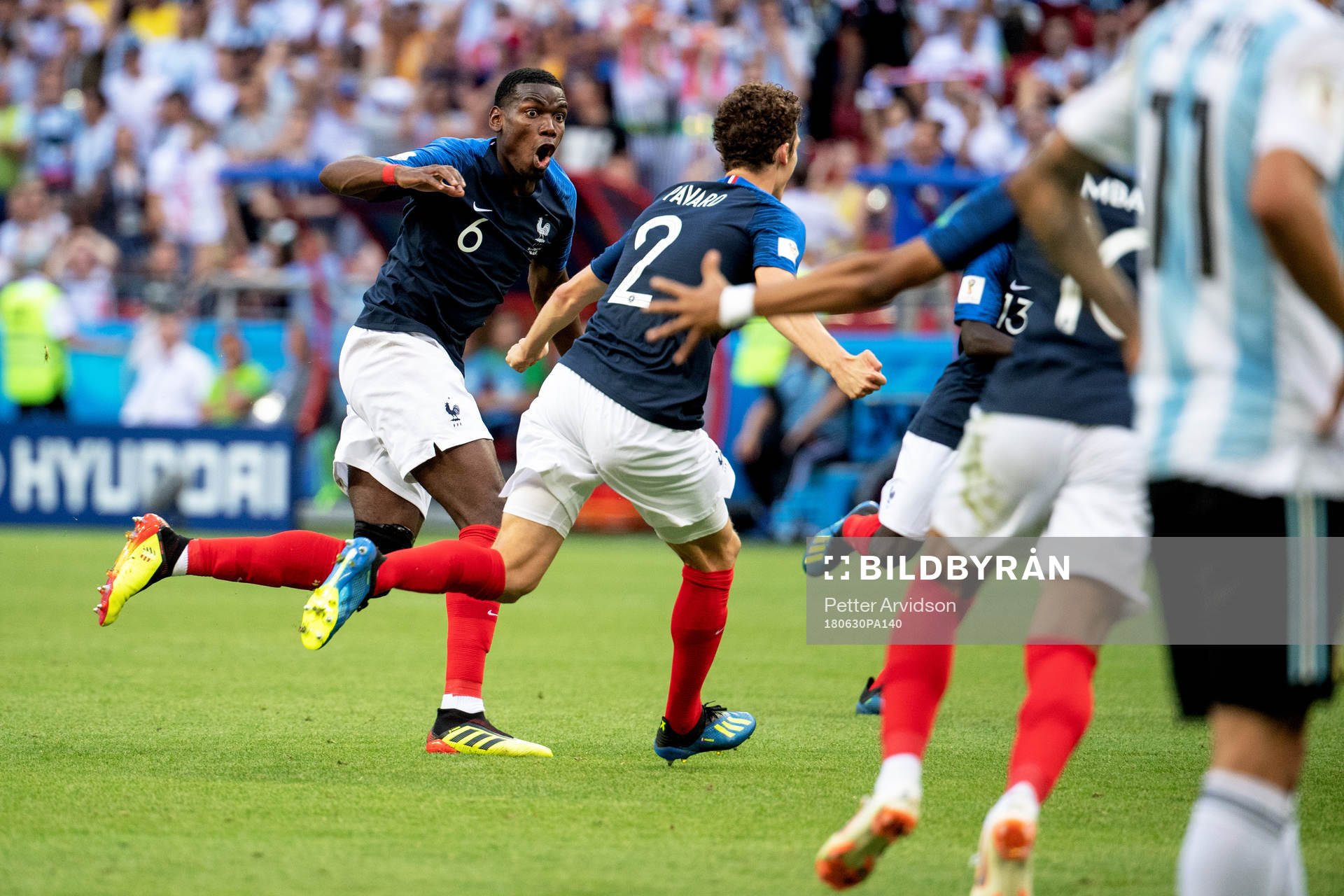 Benjamin Pavard of France celebrates with his teammates