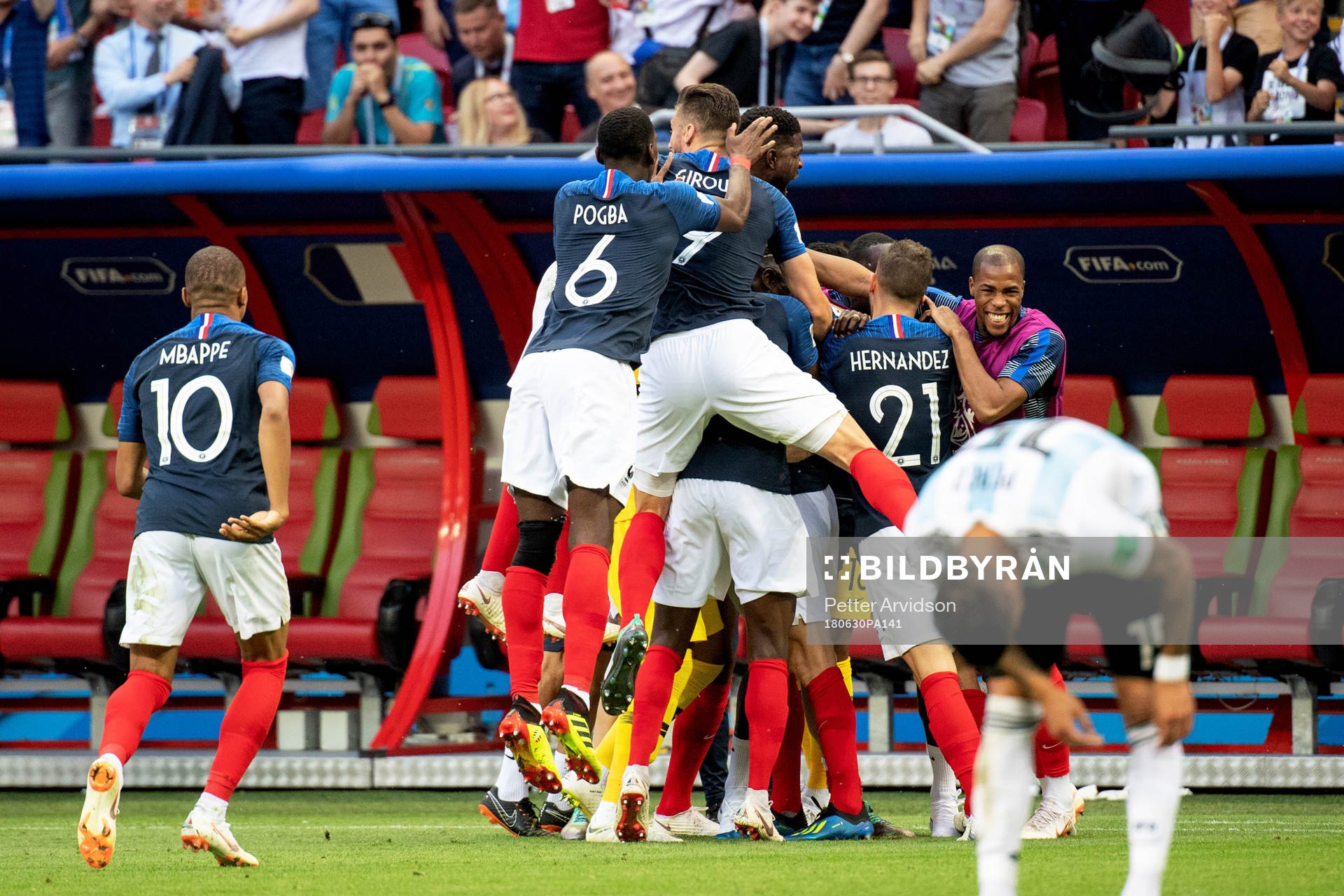 Benjamin Pavard of France celebrates with his teammates