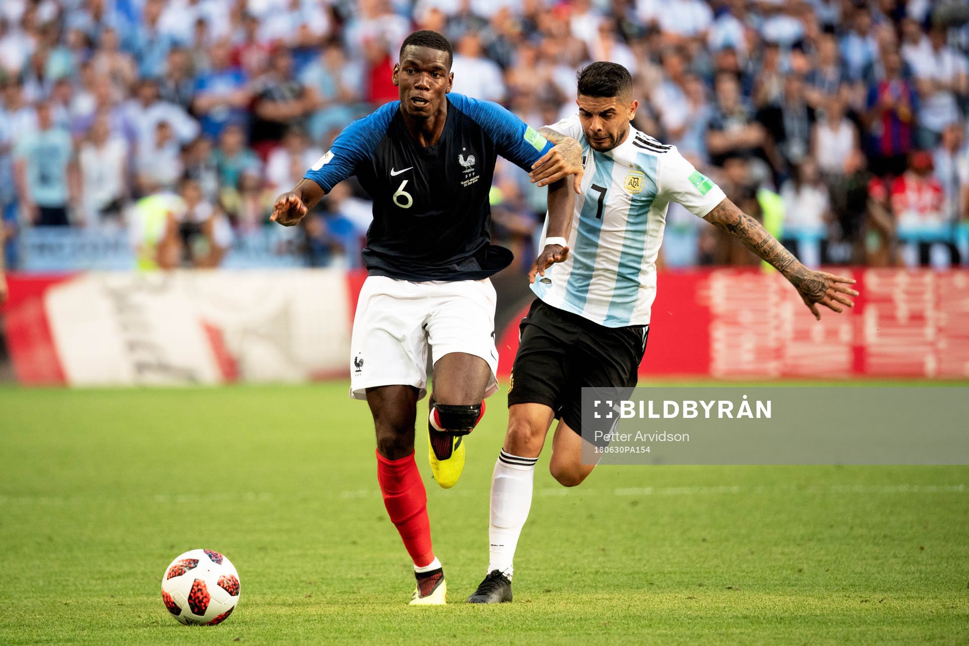 Paul Pogba of France and Ever Banega of Argentina