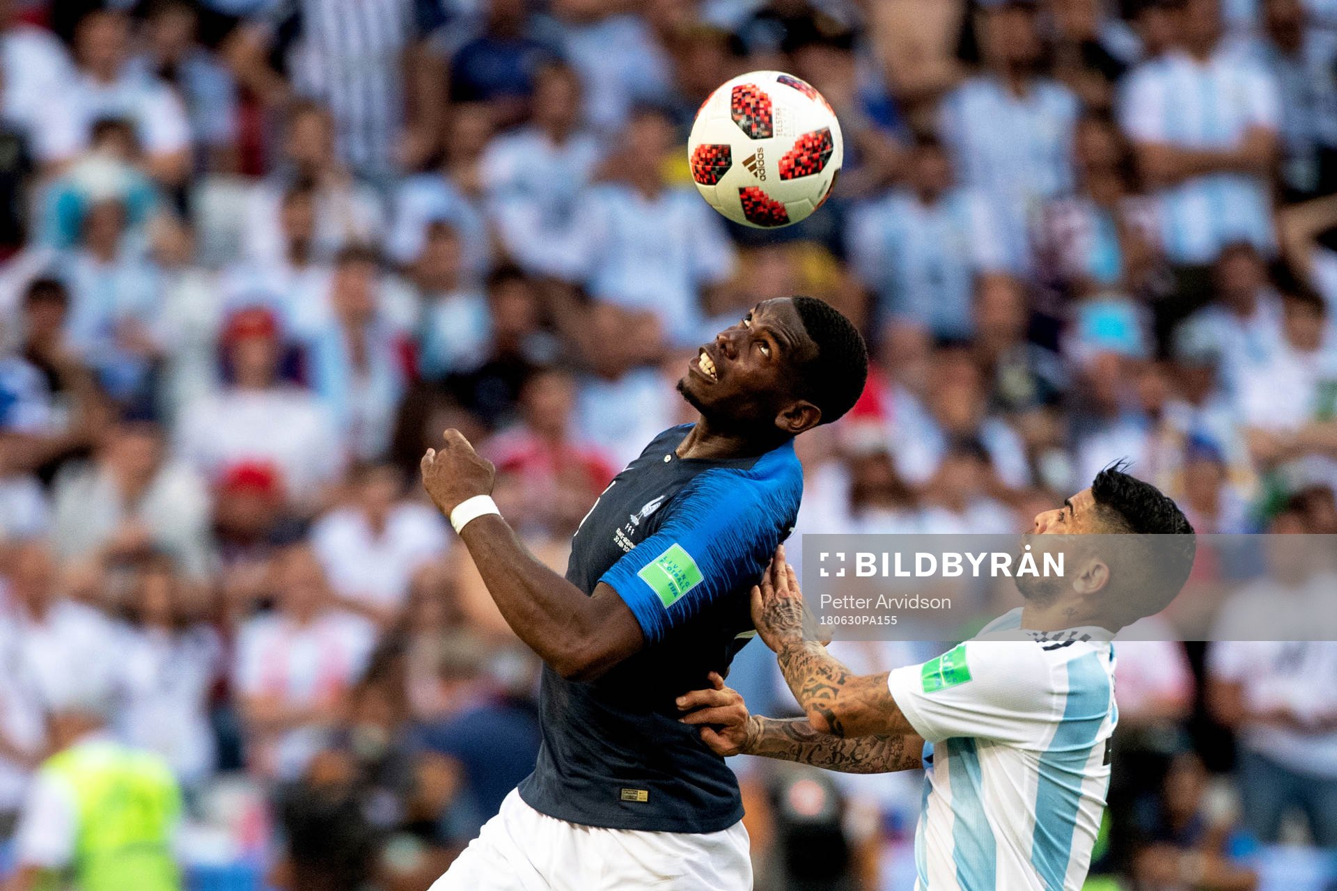 Paul Pogba of France and Ever Banega of Argentina