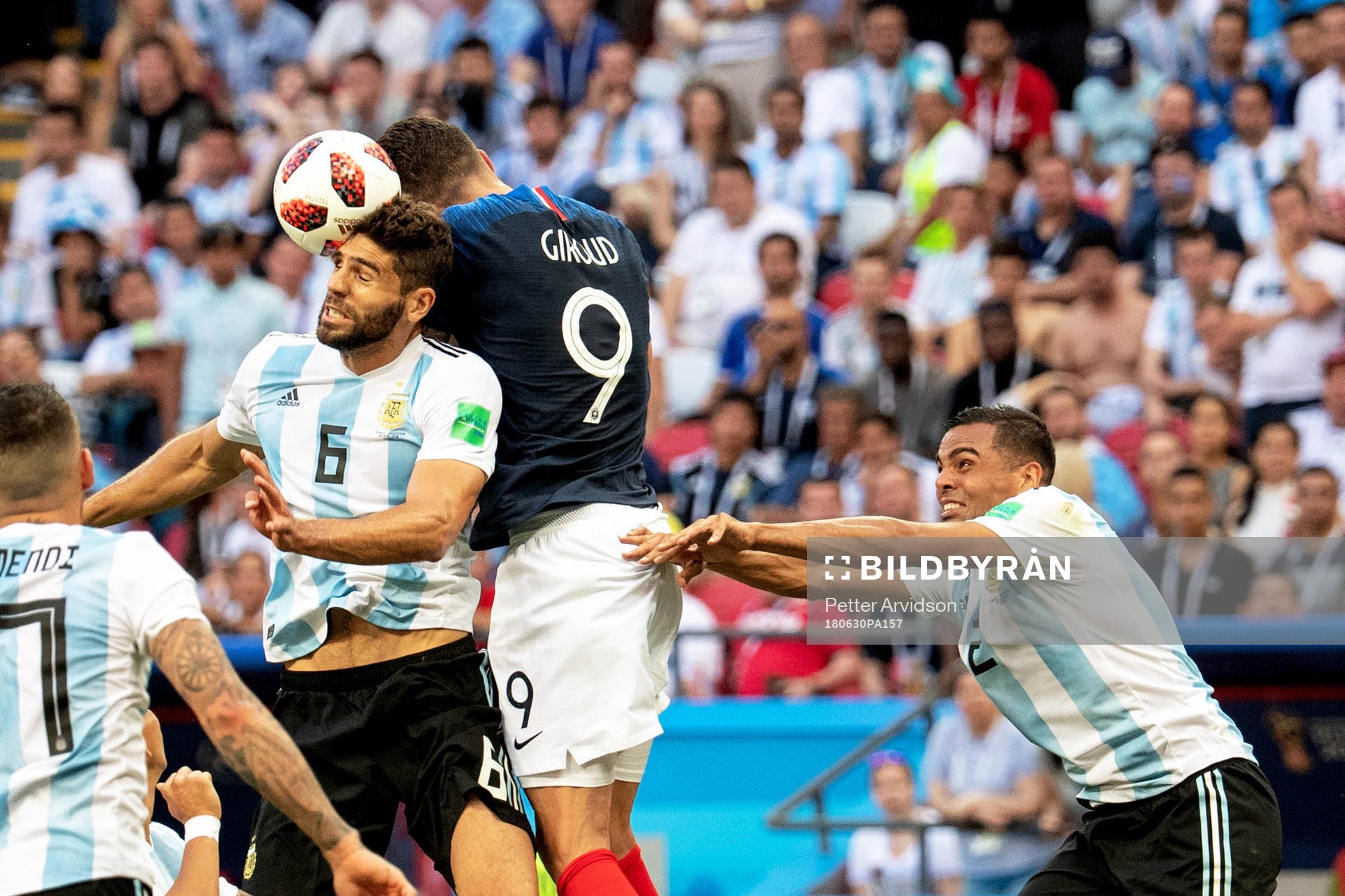 Federico Fazio of Argentina and Olivier Giroud of France