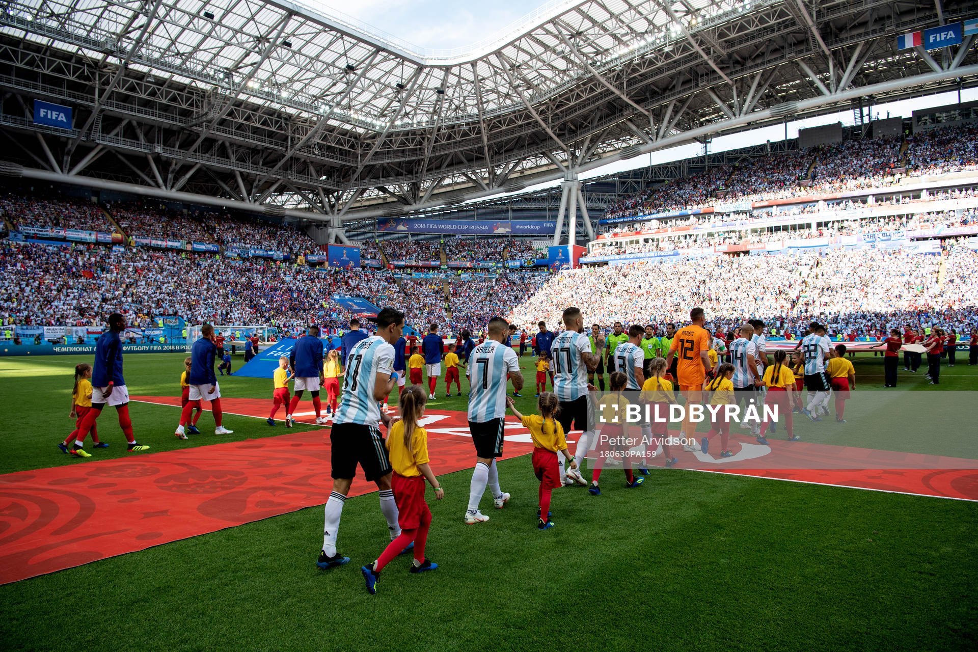 Teams enter the pitch befors the FIFA World Cup round of 16