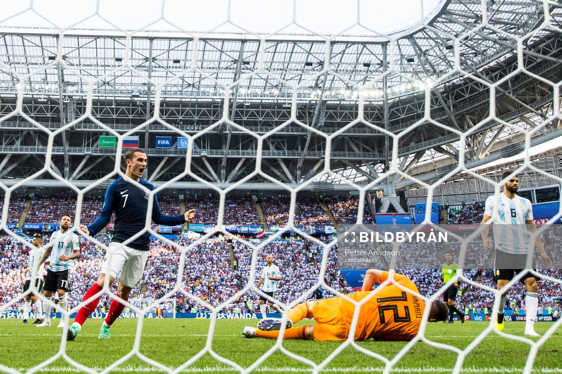 Benjamin Pavard of France (not pictured) scores 2-2 and Antoine Griezmann celebrates during the FIFA World Cup round of 16 match between France and Argentina on June 30, 2018 in Kazan.